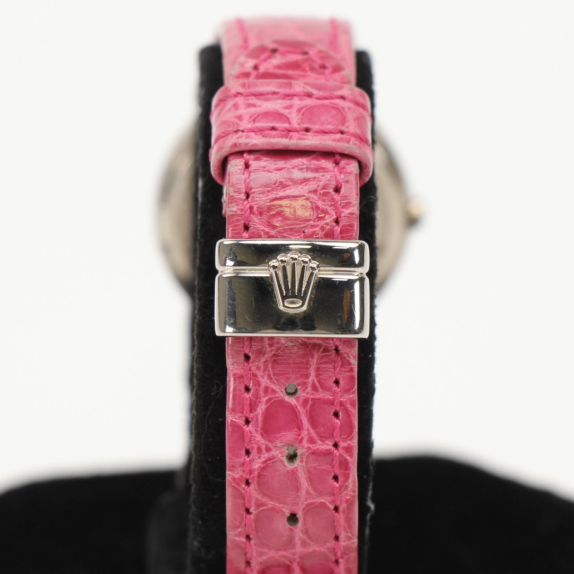 Rolex Cellini gold watch with sleek design and leather strap, showcasing elegant craftsmanship and classic style.