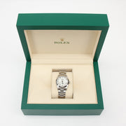 Gold & Beyond Rolex Datejust watch with stainless steel and gold bracelet, classic dial, and fluted bezel.