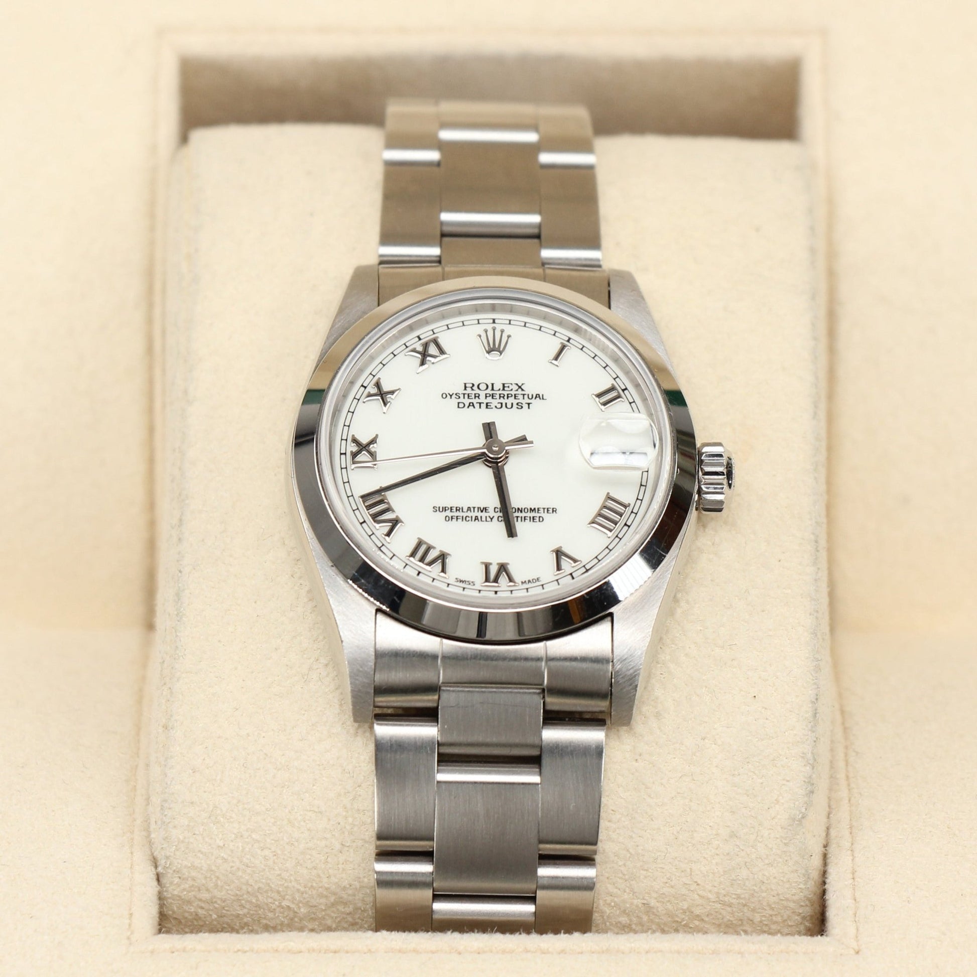 Rolex Datejust watch with gold-tone bracelet and silver dial, showcasing luxury timepiece design from Gold & Beyond.