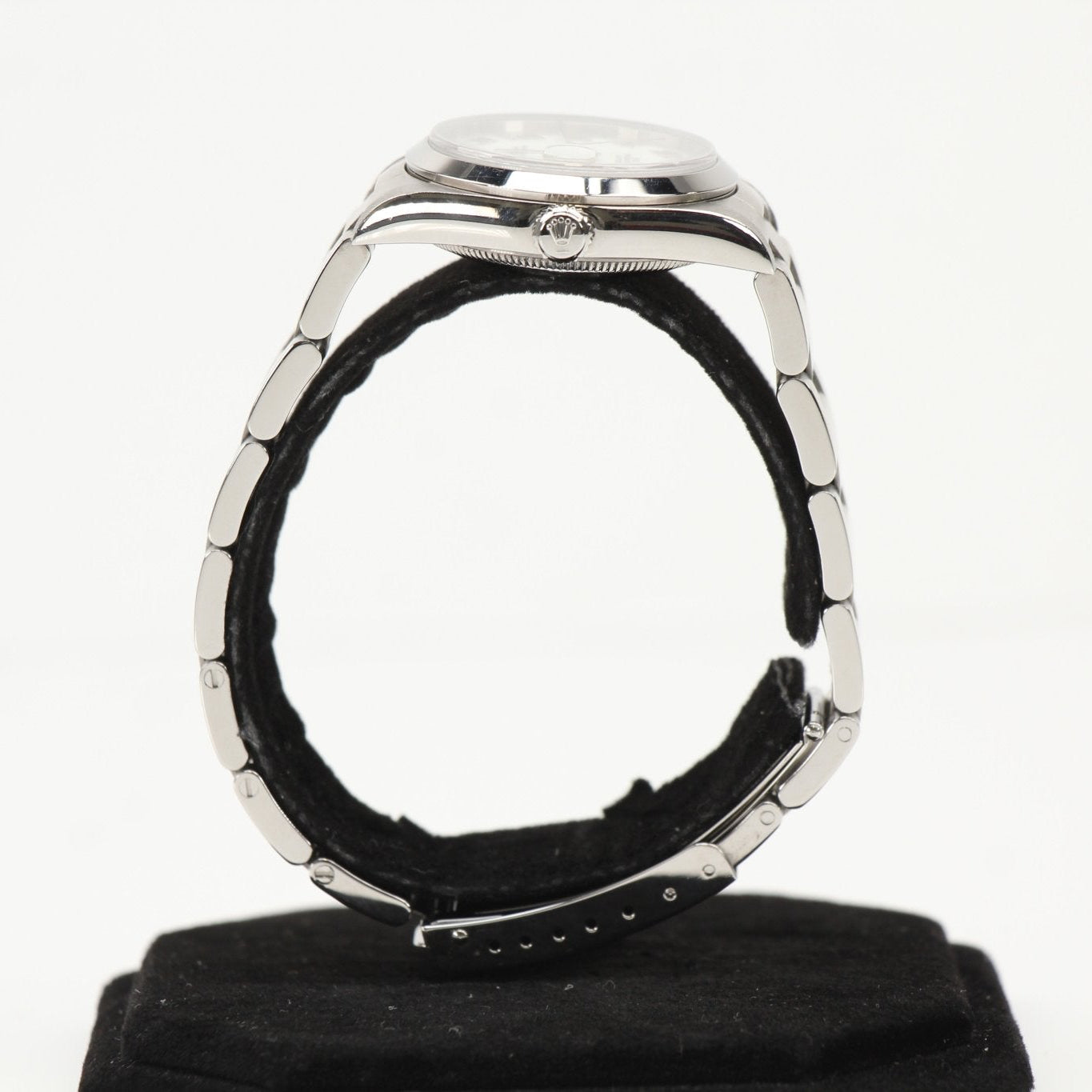 Gold & Beyond Rolex Datejust watch with stainless steel bracelet and fluted bezel, showcasing a classic elegant design.