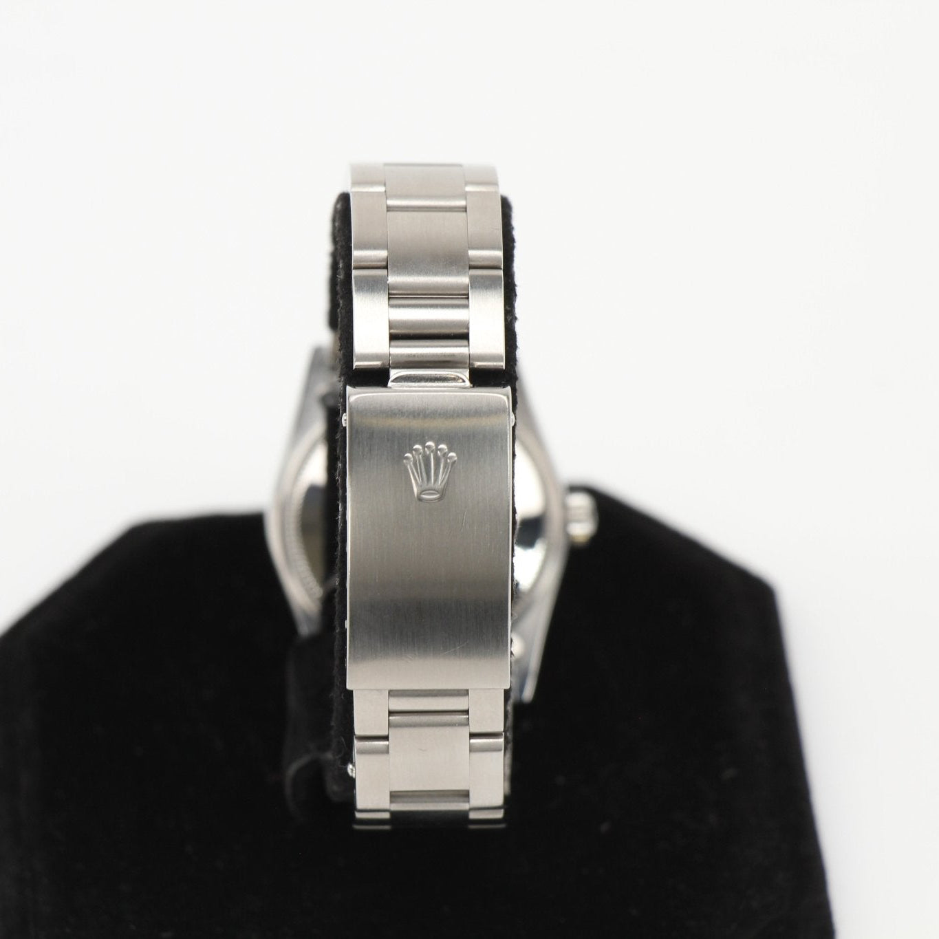 Gold & Beyond Rolex Datejust watch with gold bracelet and silver dial, showcasing elegant luxury timepiece.