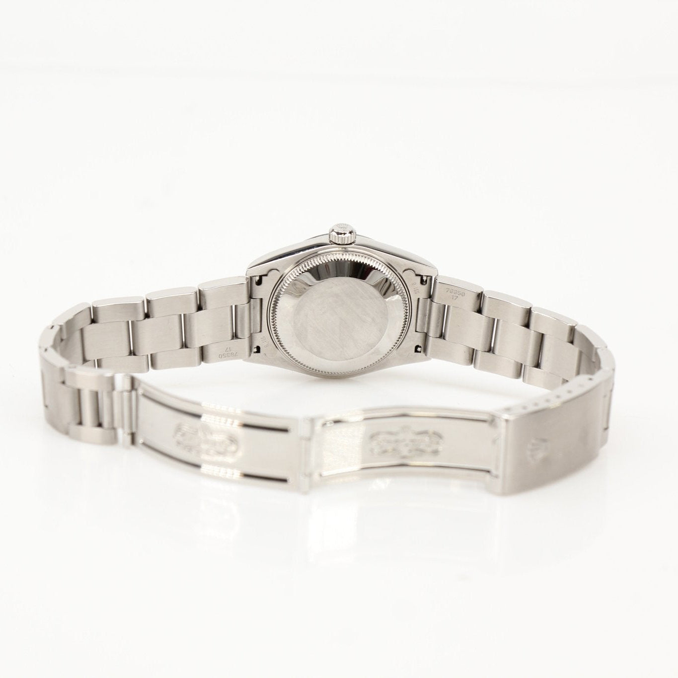 Gold & Beyond Rolex Datejust watch with gold bracelet and silver dial, showcasing elegant luxury timepiece.