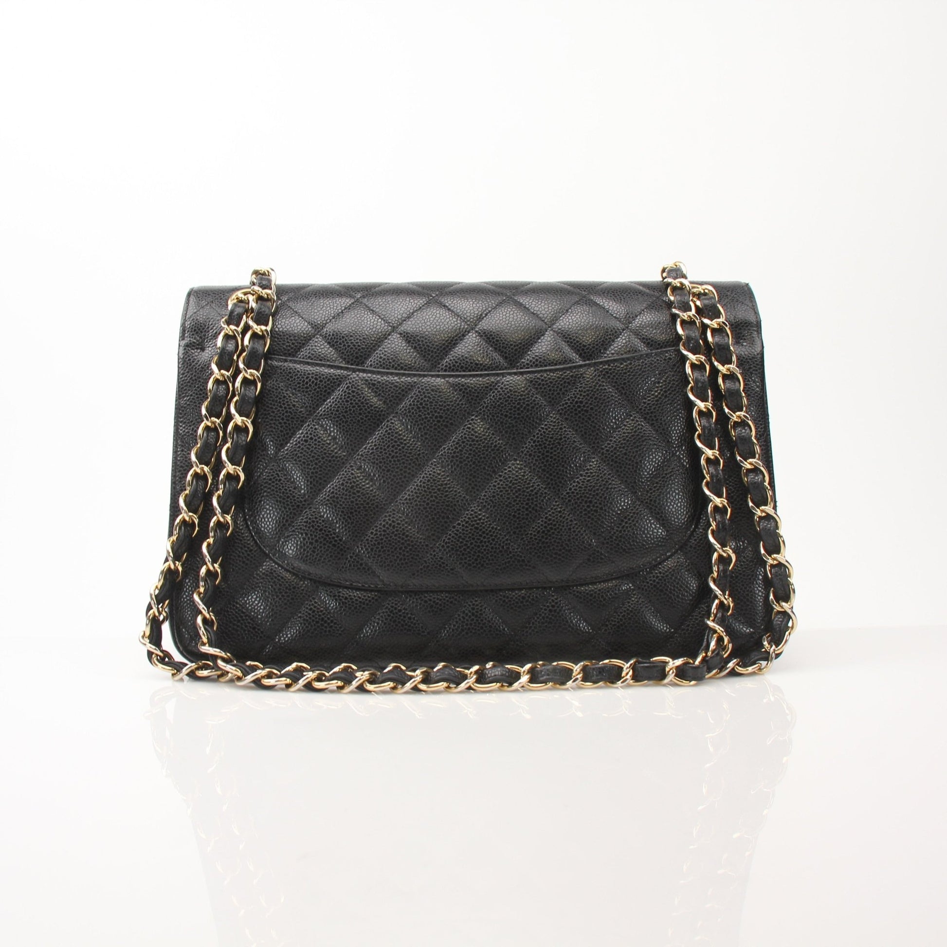 Black Chanel Large Classic Flap Shoulder Bag, elegant handbag with gold hardware and quilted leather design by Gold & Beyond.