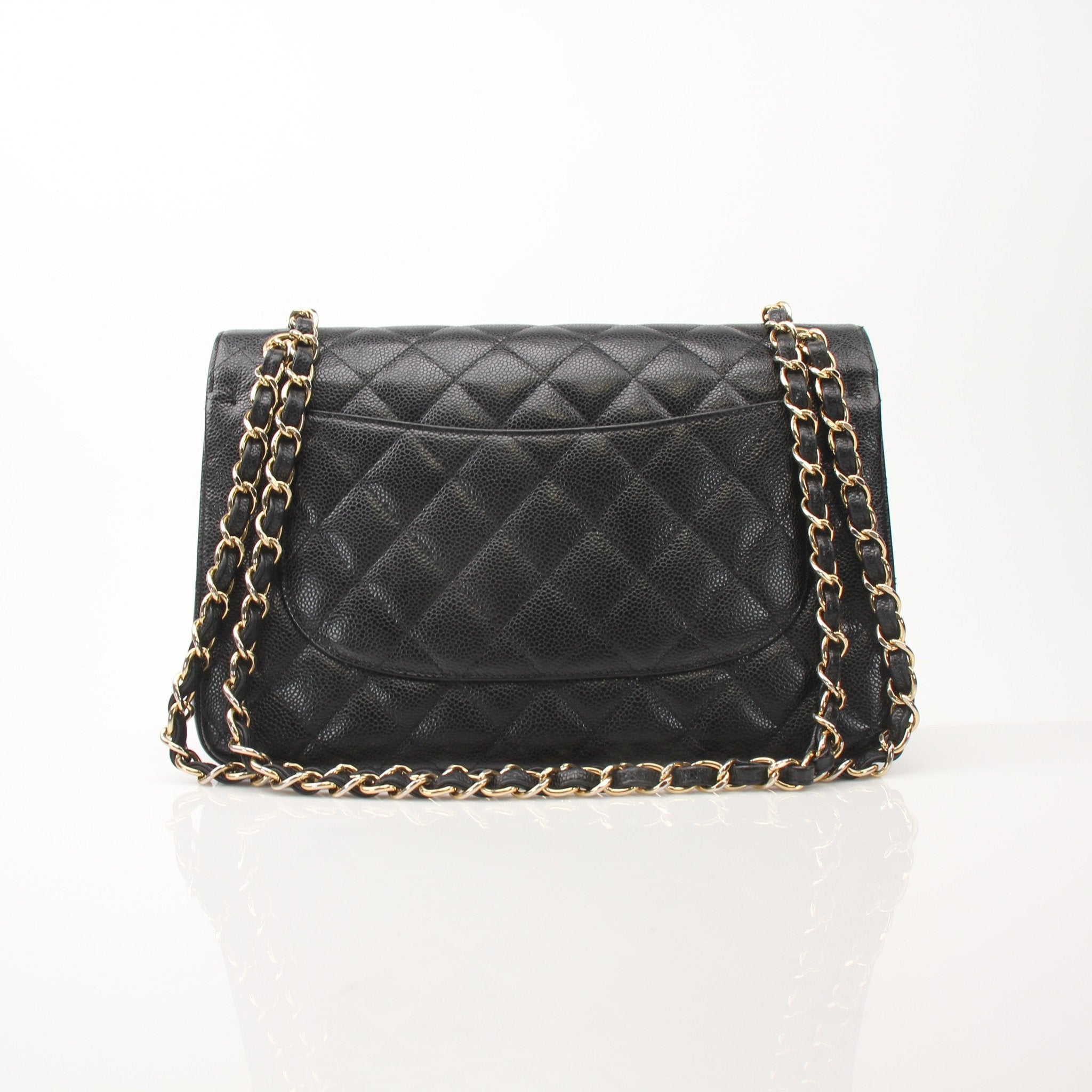 Black Chanel Large Classic Flap Shoulder Bag, elegant handbag with gold hardware and quilted leather design by Gold & Beyond.