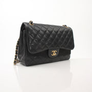Chanel Large Classic Flap Black Shoulder Bag, elegant handbag with gold hardware and quilted leather design.