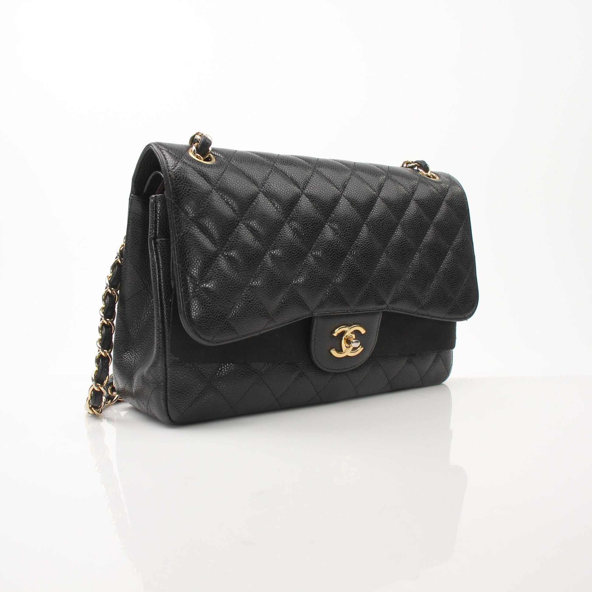 Chanel Large Classic Flap Black Shoulder Bag, elegant handbag with gold hardware and quilted leather design.