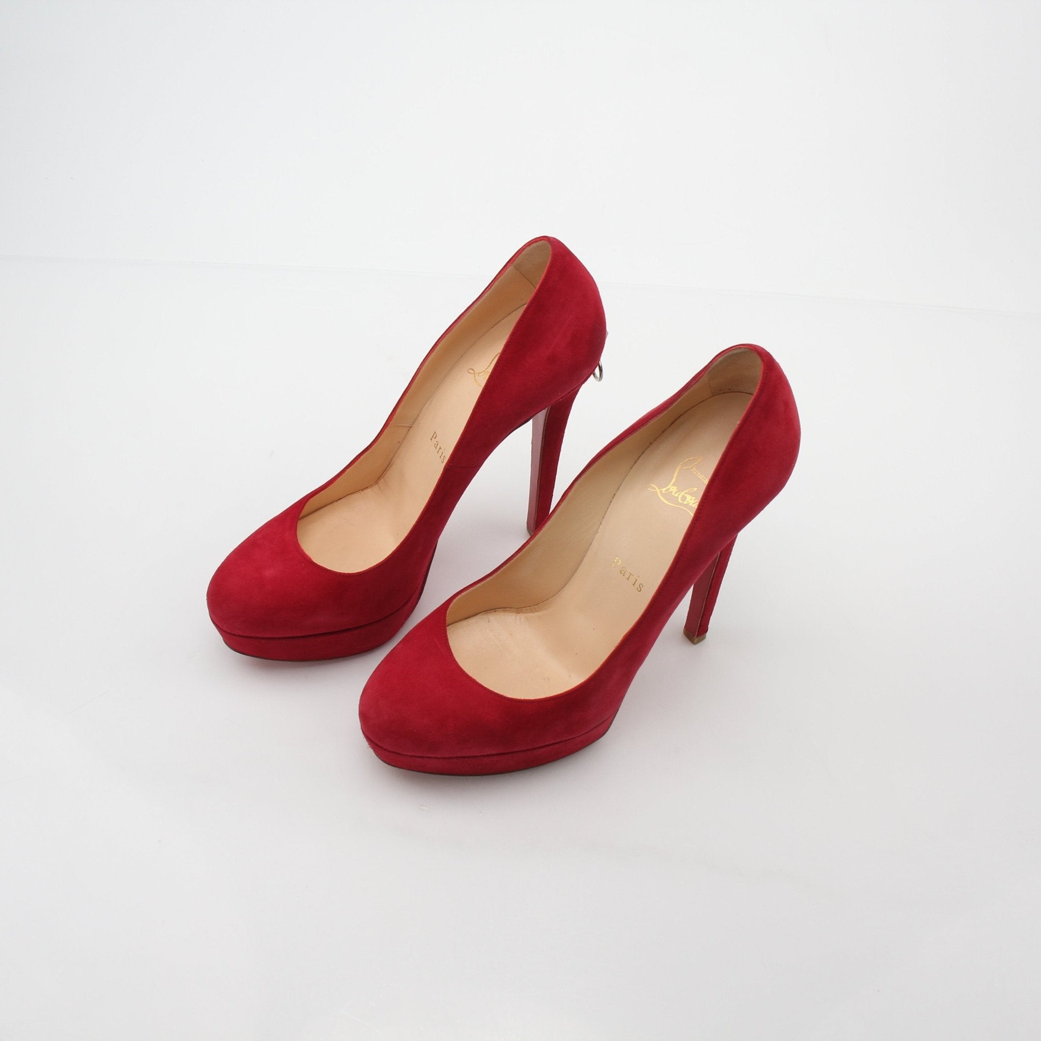 Christian Louboutin Red Biancazip suede platform heels with high stiletto heels and signature red soles.