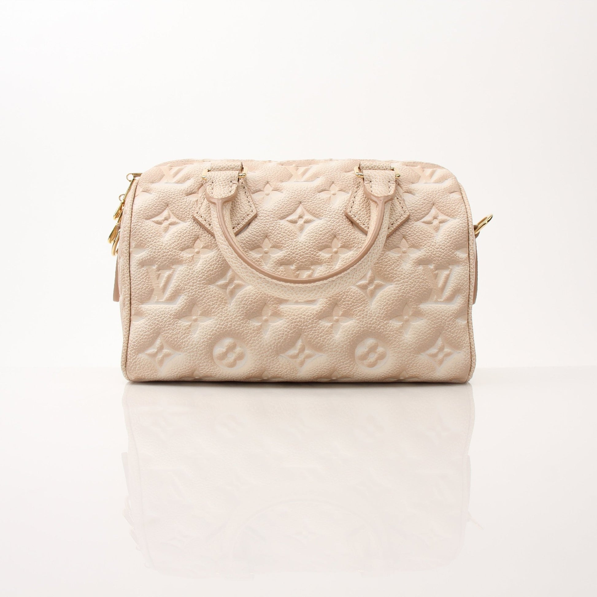 Louis Vuitton Speedy Bandoulière handbag in classic Monogram canvas with leather trim and adjustable shoulder strap.