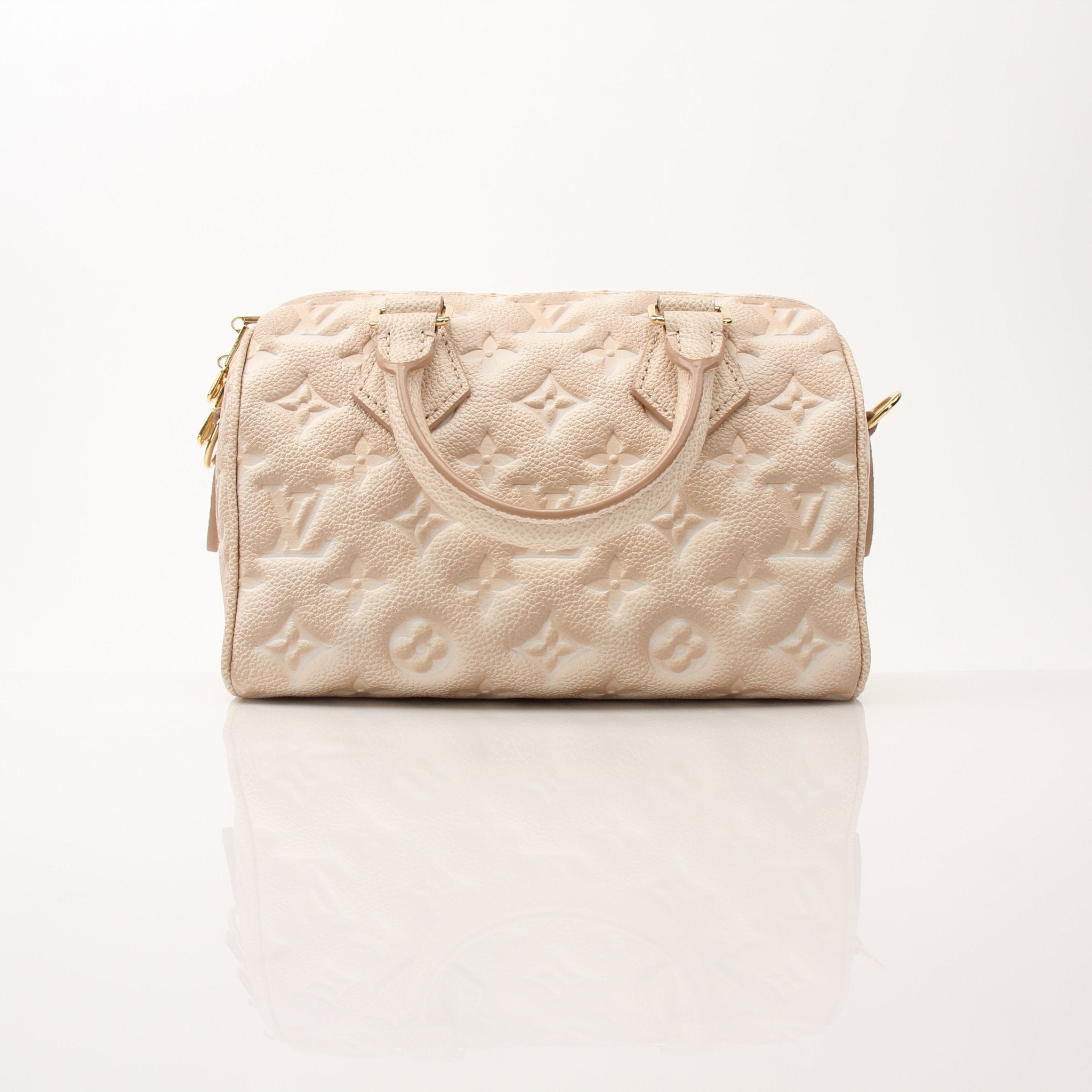 Louis Vuitton Speedy Bandoulière handbag in classic Monogram canvas with leather trim and adjustable shoulder strap.