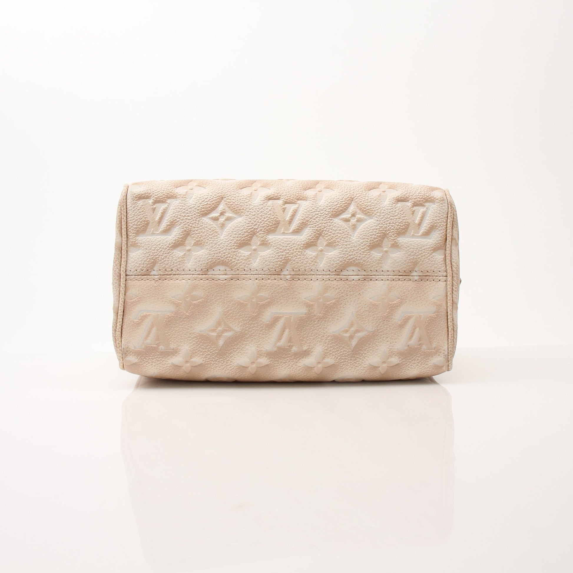 Louis Vuitton Speedy Bandoulière handbag with gold hardware, featuring signature monogram canvas and adjustable strap.