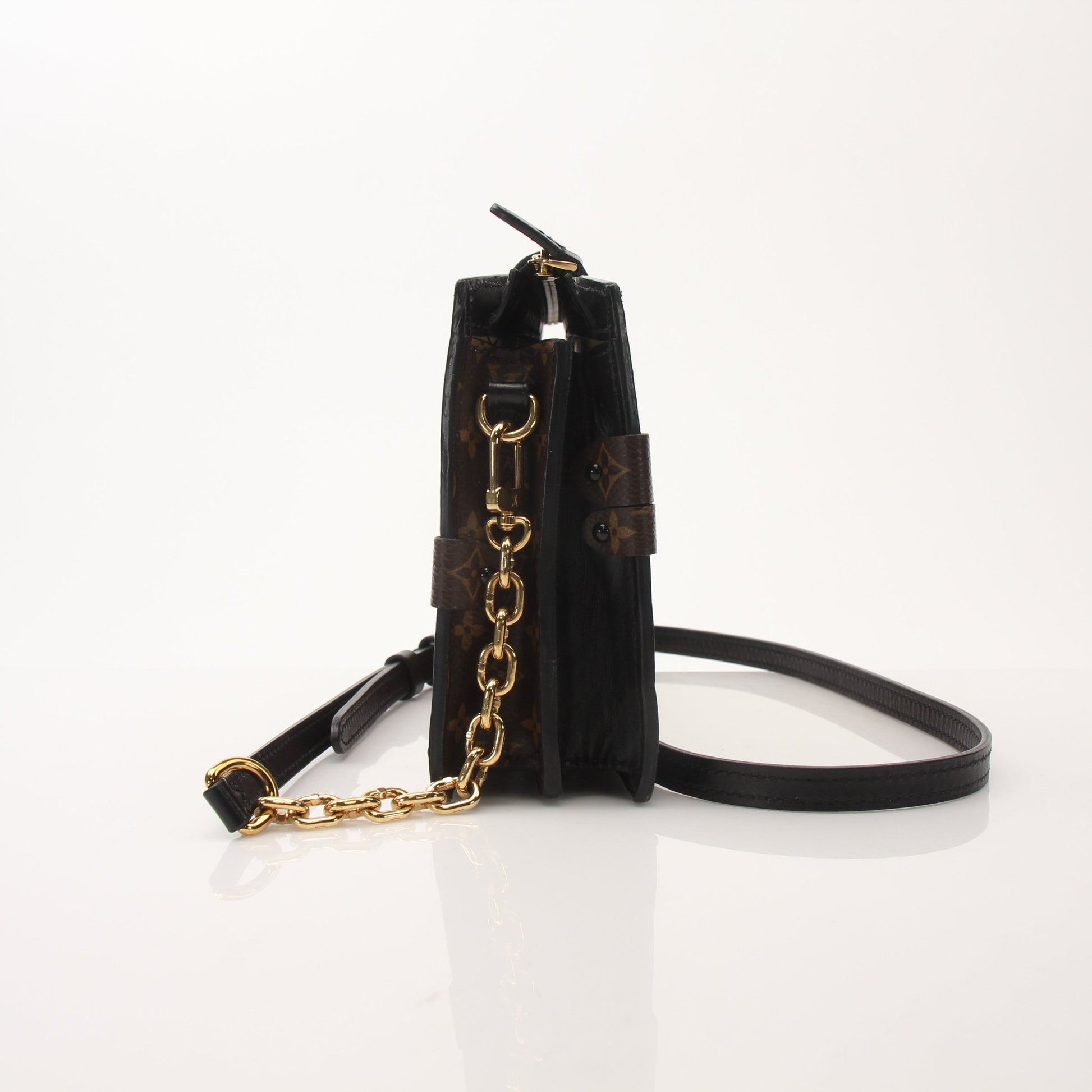 Louis Vuitton Monogram Trunk crossbody handbag by Gold & Beyond, showcasing the iconic monogram pattern and adjustable strap.