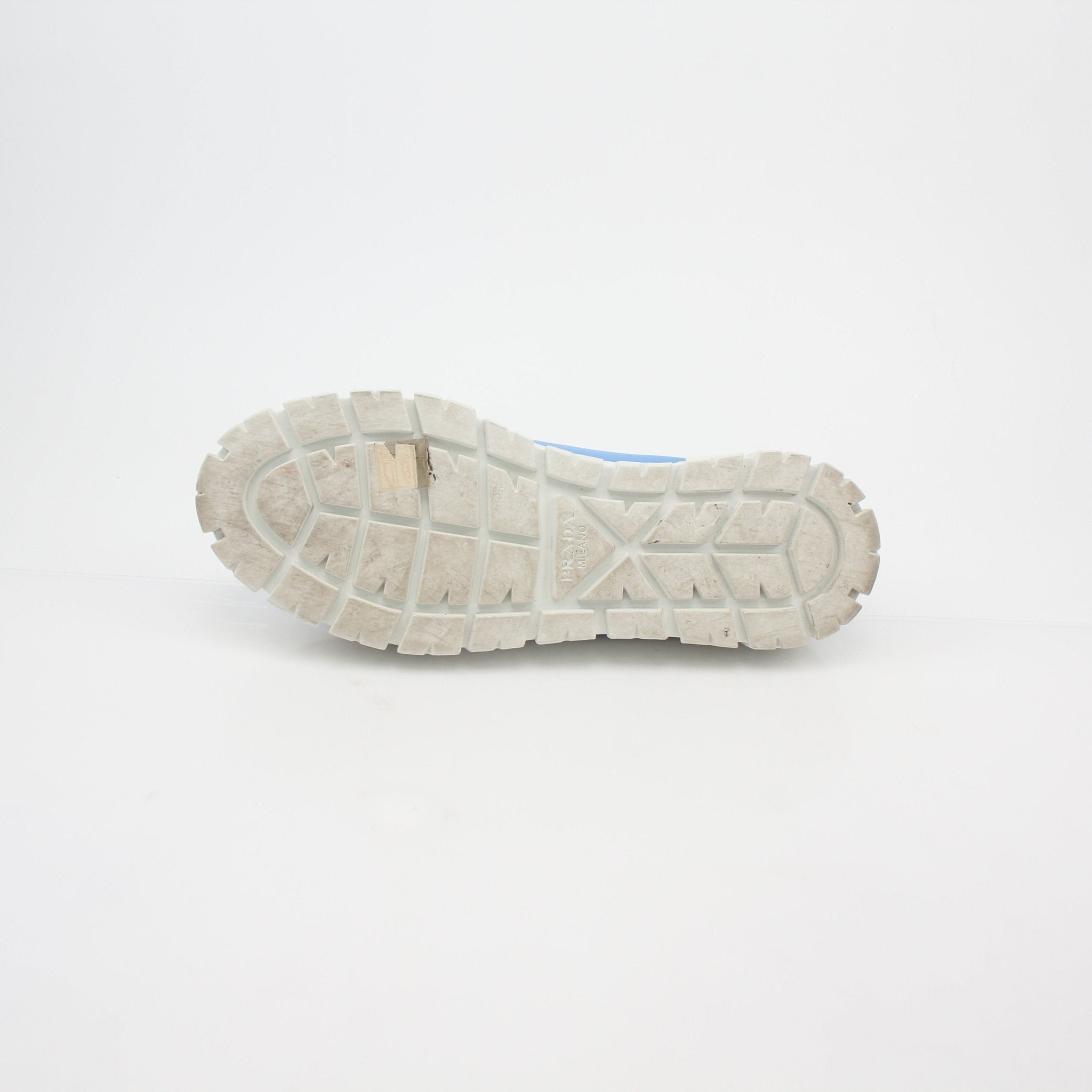 Gold & Beyond Prada light blue double wheel low top sneakers with white soles and stylish design, casual shoes for everyday wear.