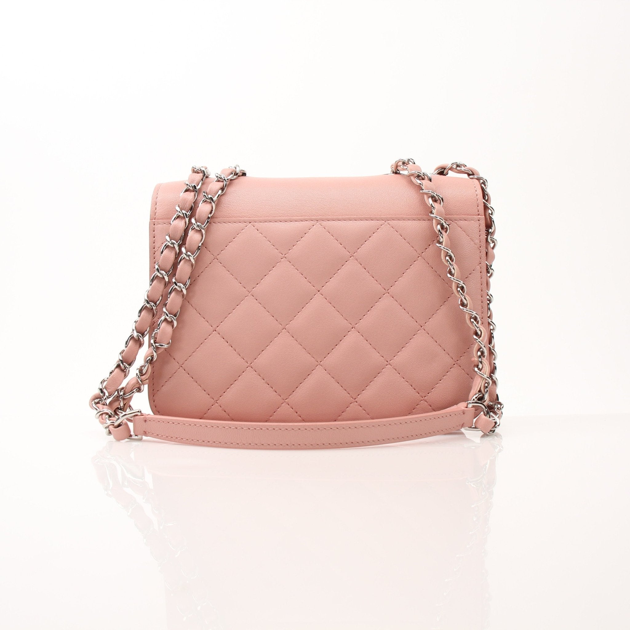 Pink Chanel CC Box Flap Shoulder Bag with gold hardware, stylish handbag featuring a classic design and elegant chain strap.