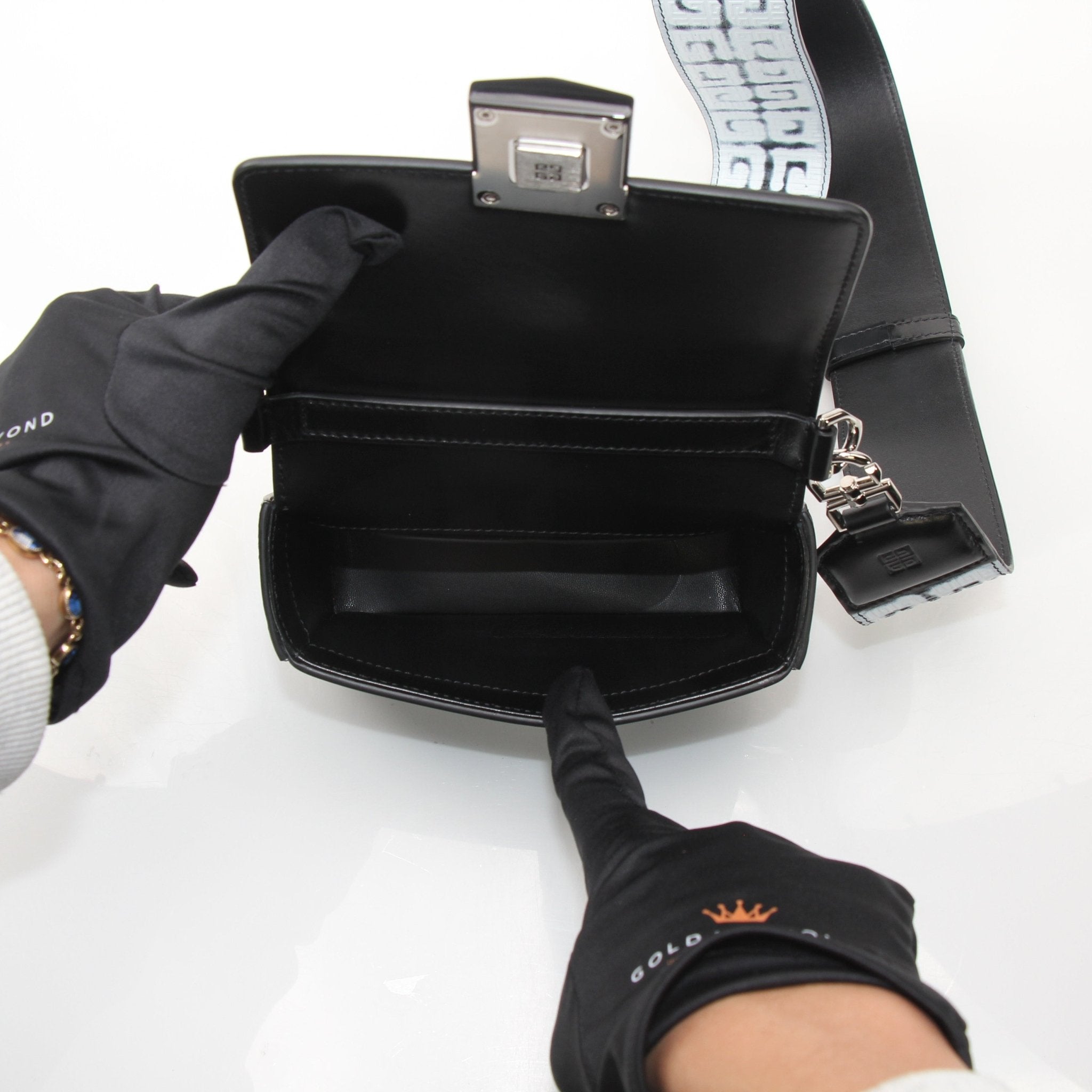 Givenchy Chito Spray Paint Mini Shoulder Bag, gold and black handbag with bold spray paint design, featuring a compact and stylish silhouette.
