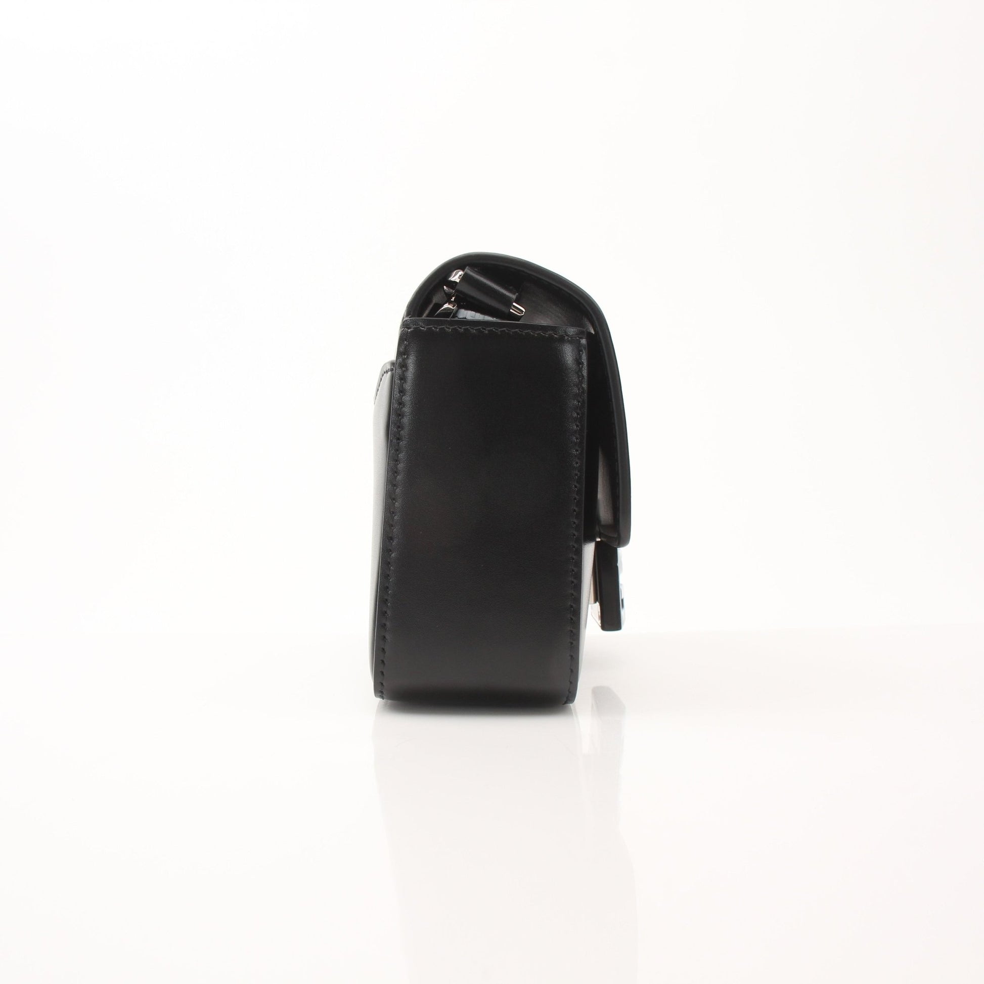 Gold & Beyond Givenchy Chito Spray Paint Mini Shoulder Bag with black and colorful design, handbag with adjustable strap.