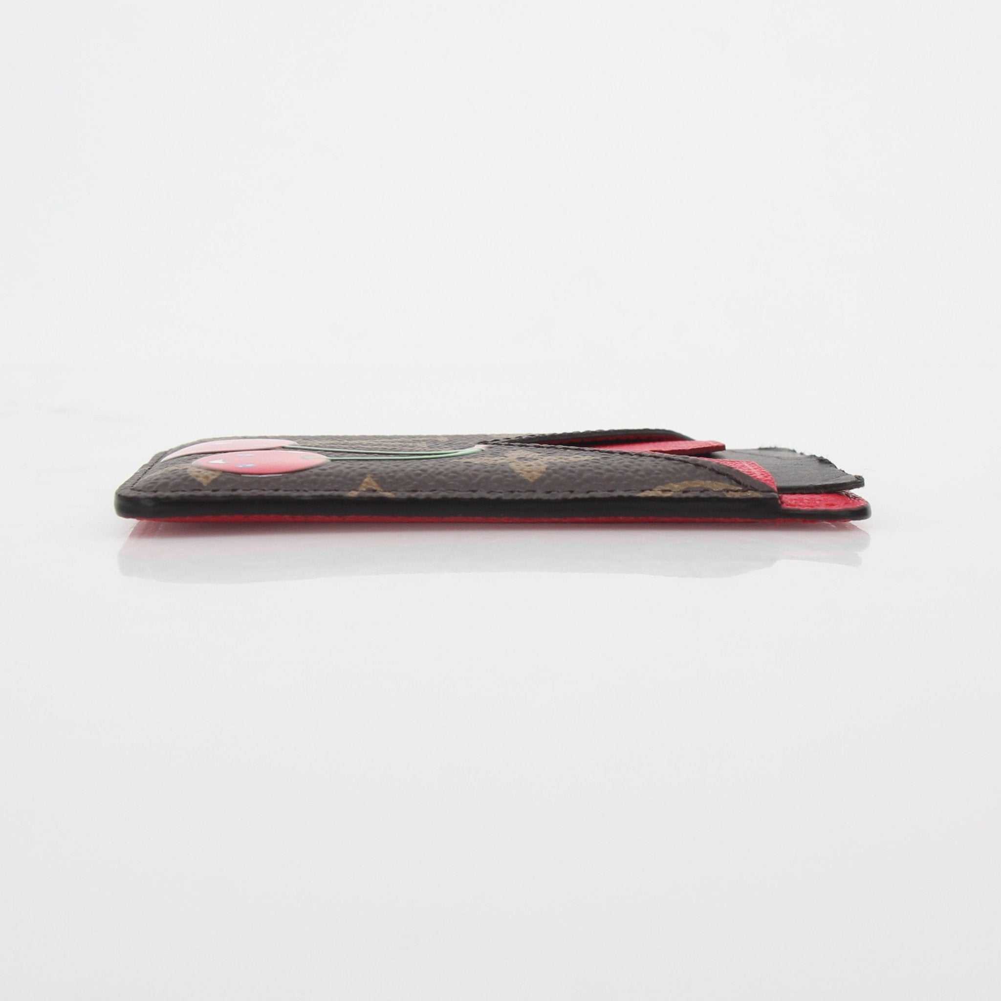 Louis Vuitton x Takashi Murakami Cherry Porte-Cartes magnet card holder with colorful floral design and compact style.