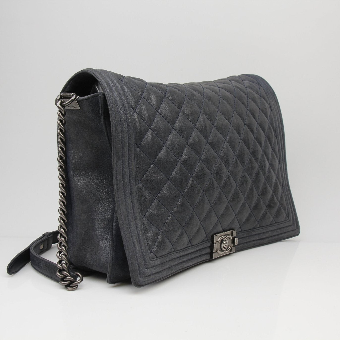 Gold & Beyond Chanel Charcoal Large Quilted Soft Boy Handbag with chain strap and signature quilting detail