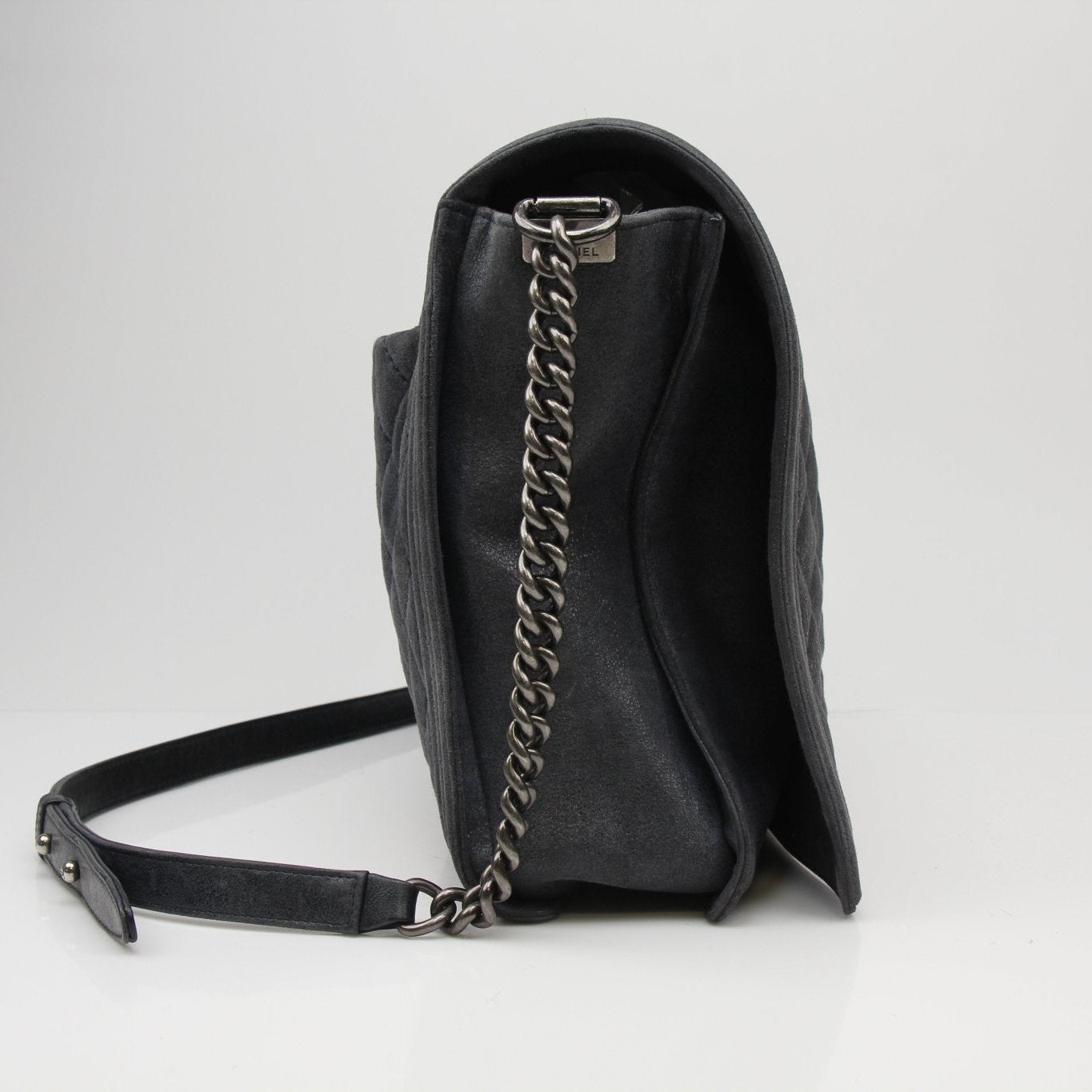Gold & Beyond Chanel Charcoal Large Quilted Soft Boy Handbag with gold hardware and chain strap, stylish and spacious accessory.