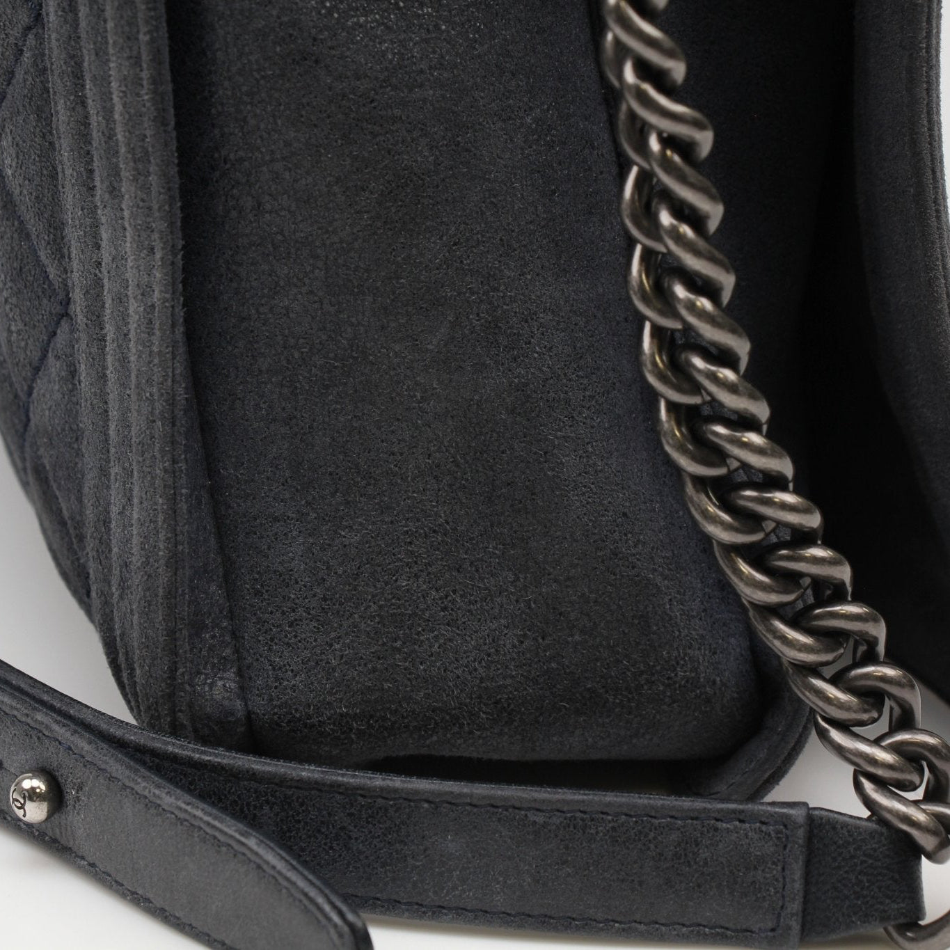 Gold & Beyond Chanel Charcoal Large Quilted Soft Boy Handbag with gold hardware and signature stitching details.