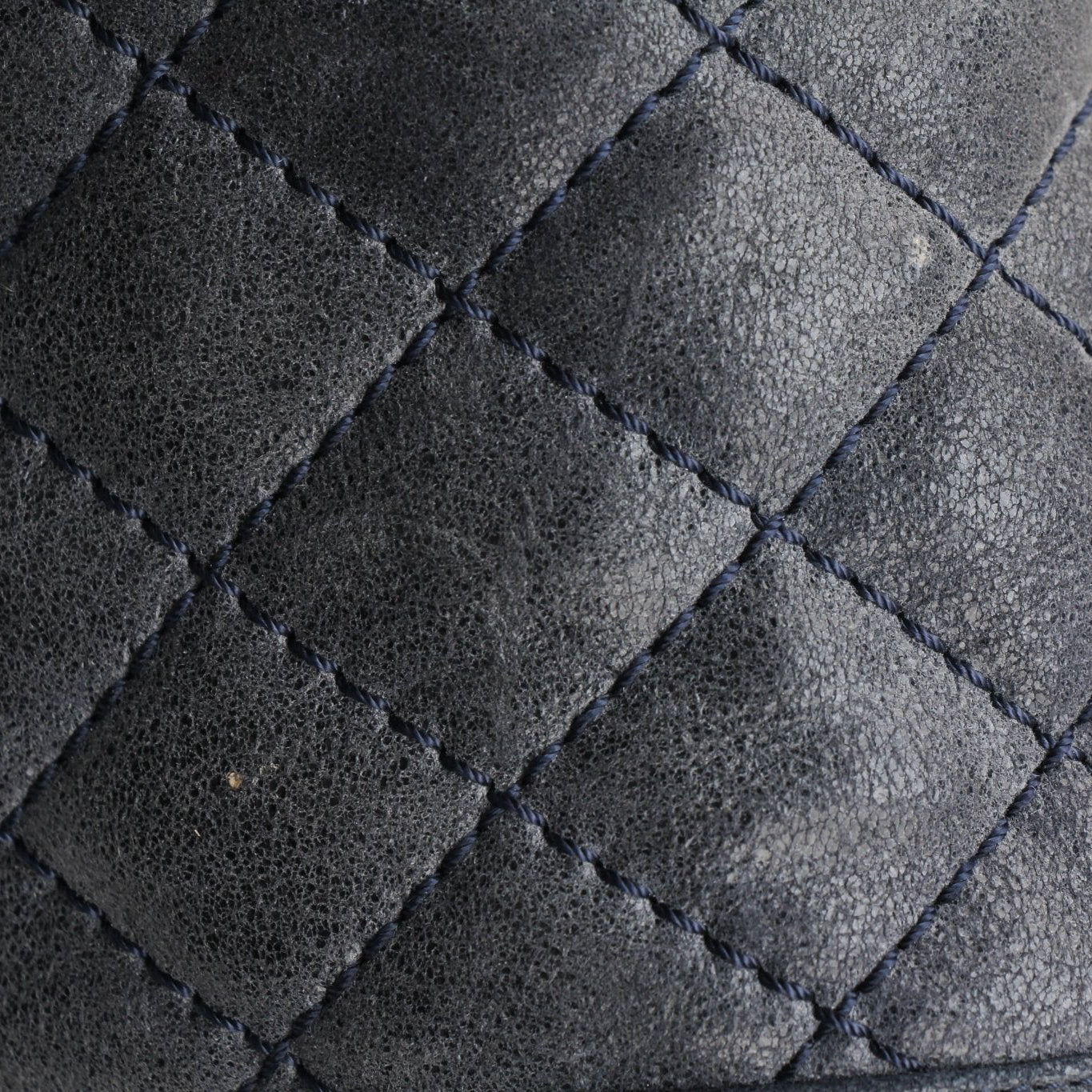 Chanel Charcoal large quilted soft boy handbag with gold chain strap and signature diamond stitching, stylish and luxurious accessory.