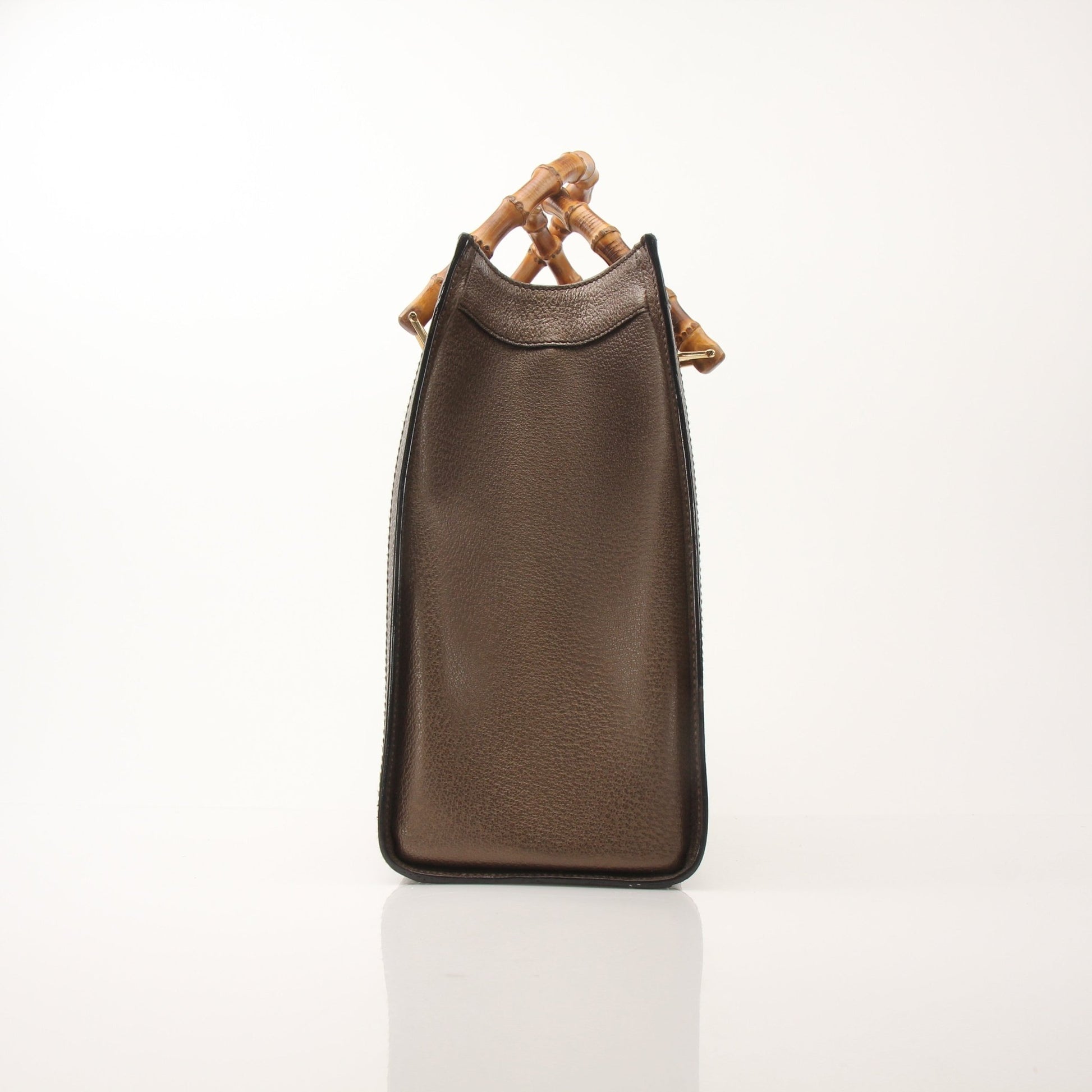 Gold & Beyond Gucci Bamboo Tote handbag with beige woven bamboo and leather handles, stylish and spacious for everyday use.