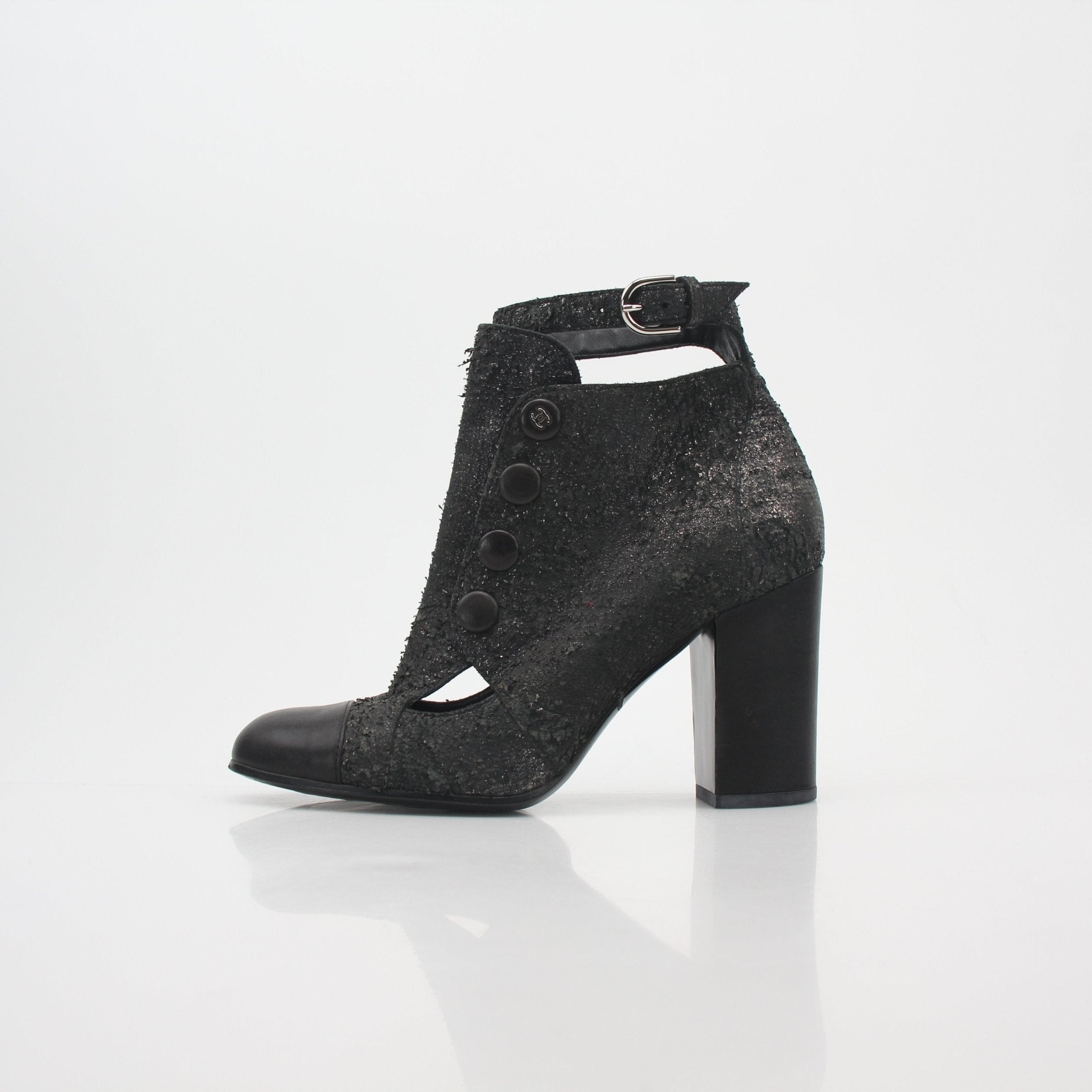 Gold & Beyond black distressed cutout ankle boots with chunky heels and stylish design, perfect for fashion-forward looks.