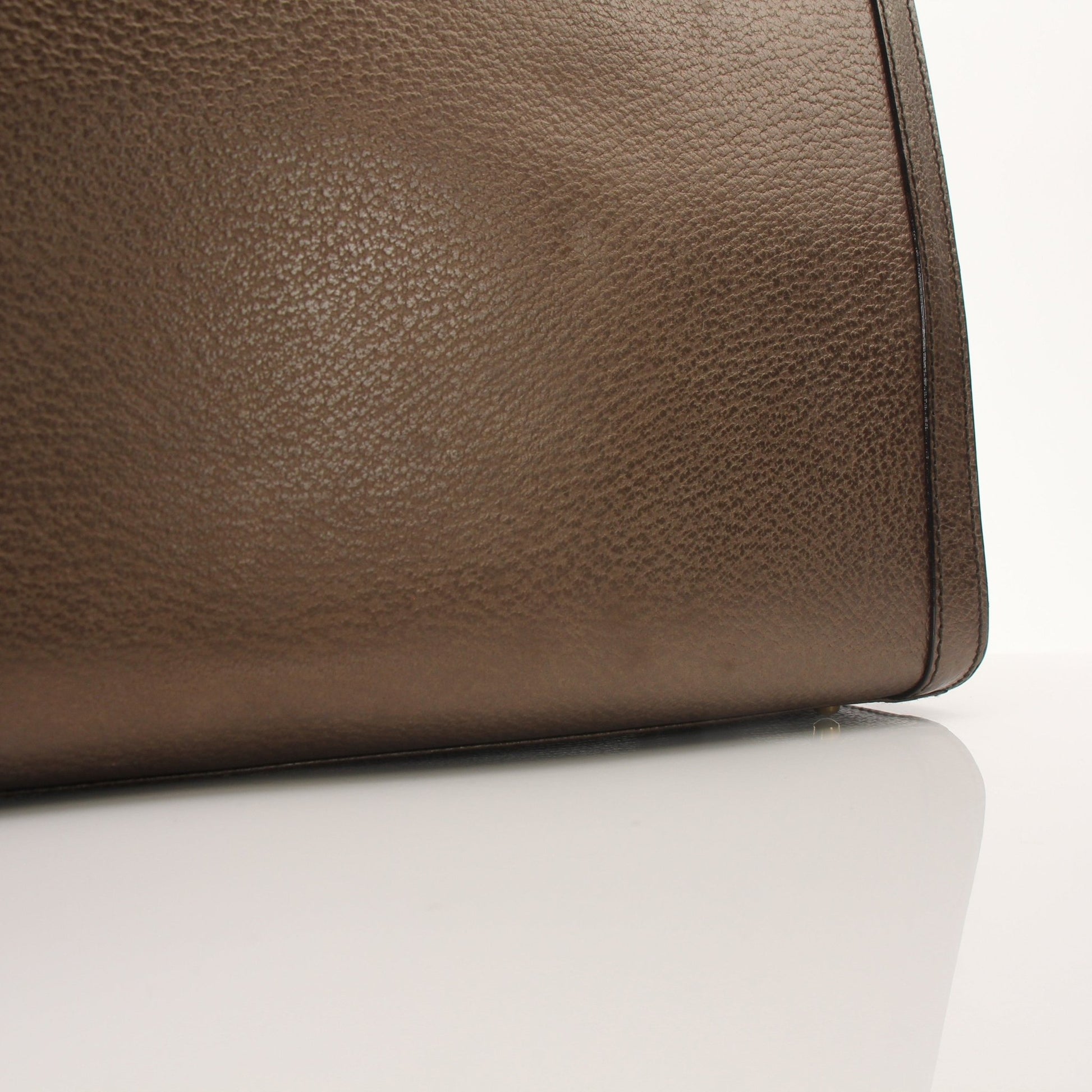 Gucci Bamboo Tote handbag with tan leather handles and natural woven bamboo body, stylish and spacious for everyday use.