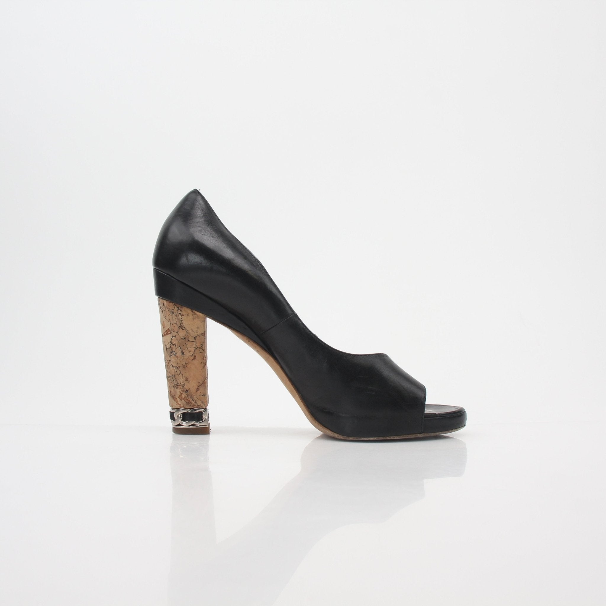 Gold & Beyond black leather Chanel-inspired cork heel peep-toe pumps with elegant design and classic style.