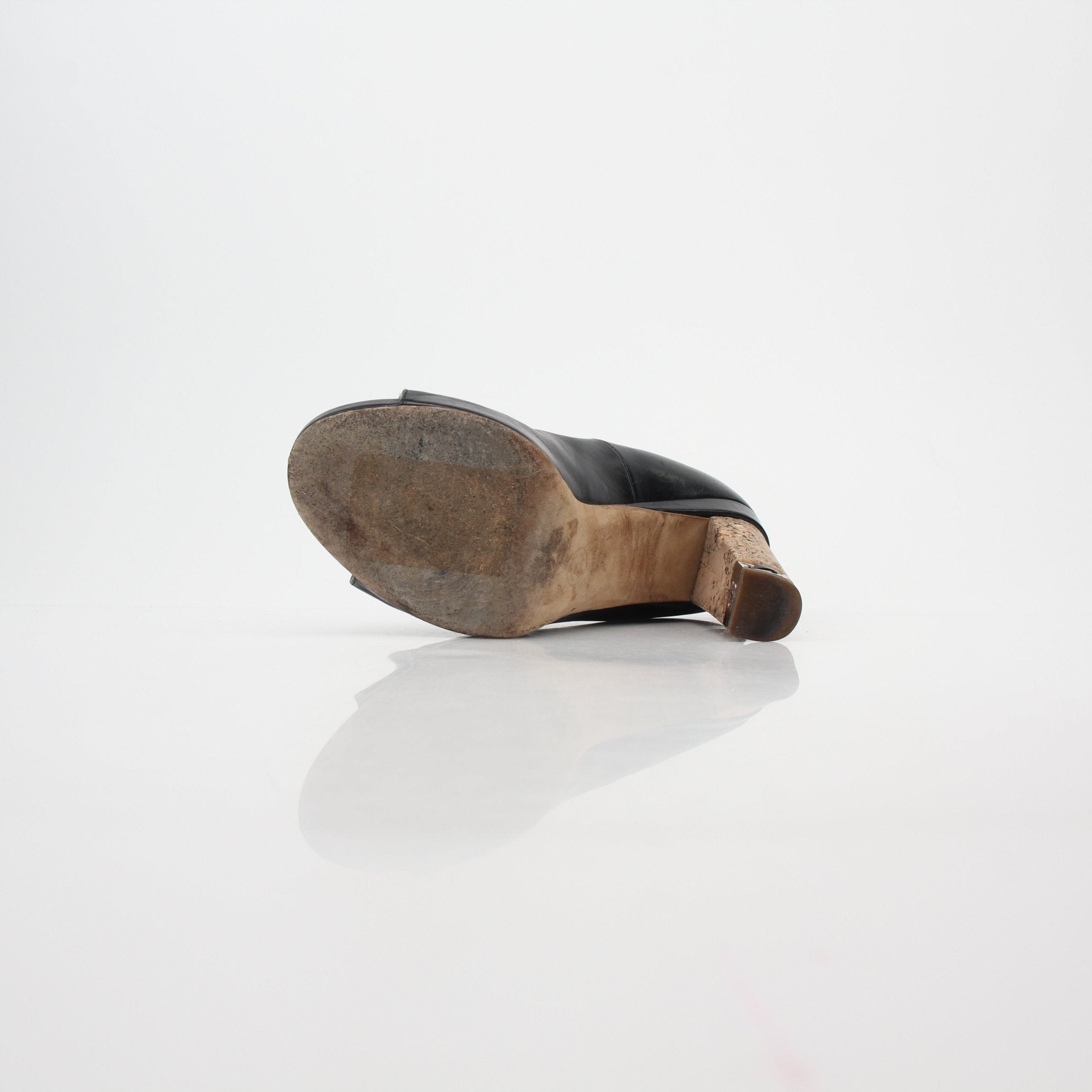 Gold & Beyond black leather peep-toe heels with cork heels, stylish Chanel-inspired pumps displayed on a white background.