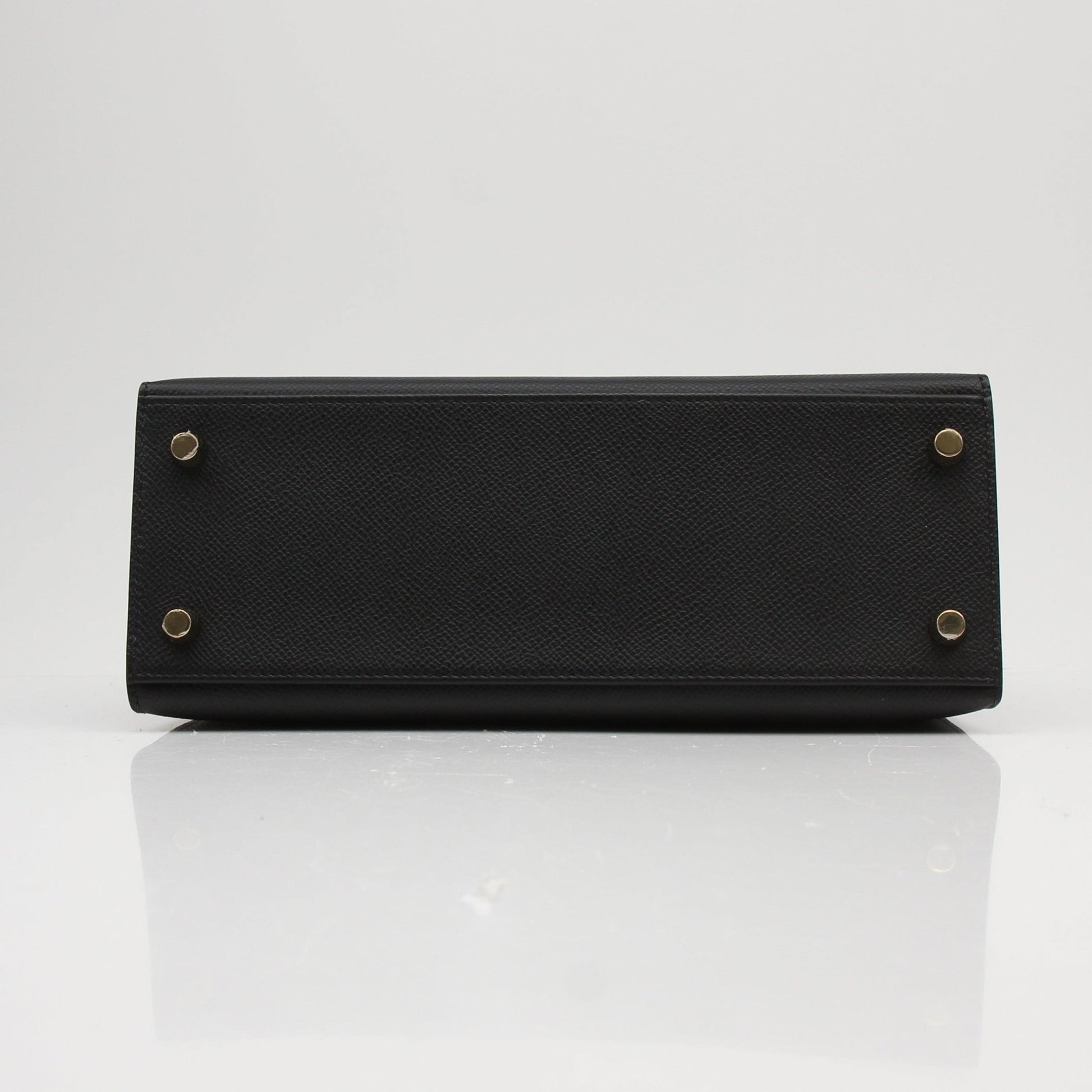 Hermès Kelly 25 Sellier handbag in leather, featuring gold hardware and structured design, from Gold & Beyond.