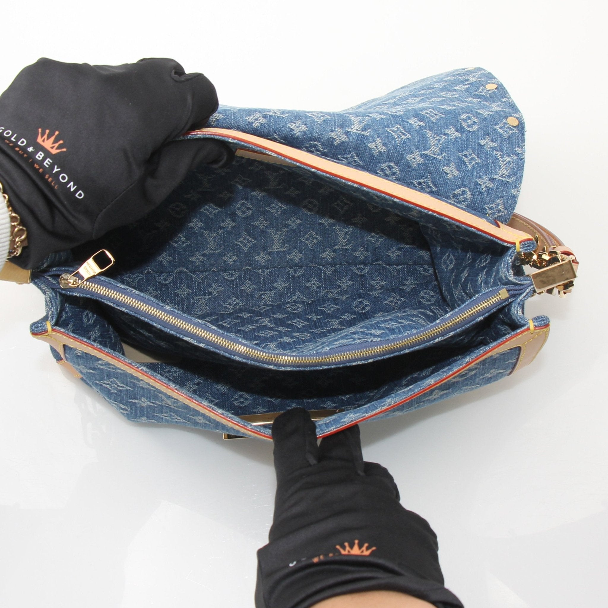 Gold & Beyond Louis Vuitton Dauphine GM shoulder handbag with signature monogram canvas and leather accents.