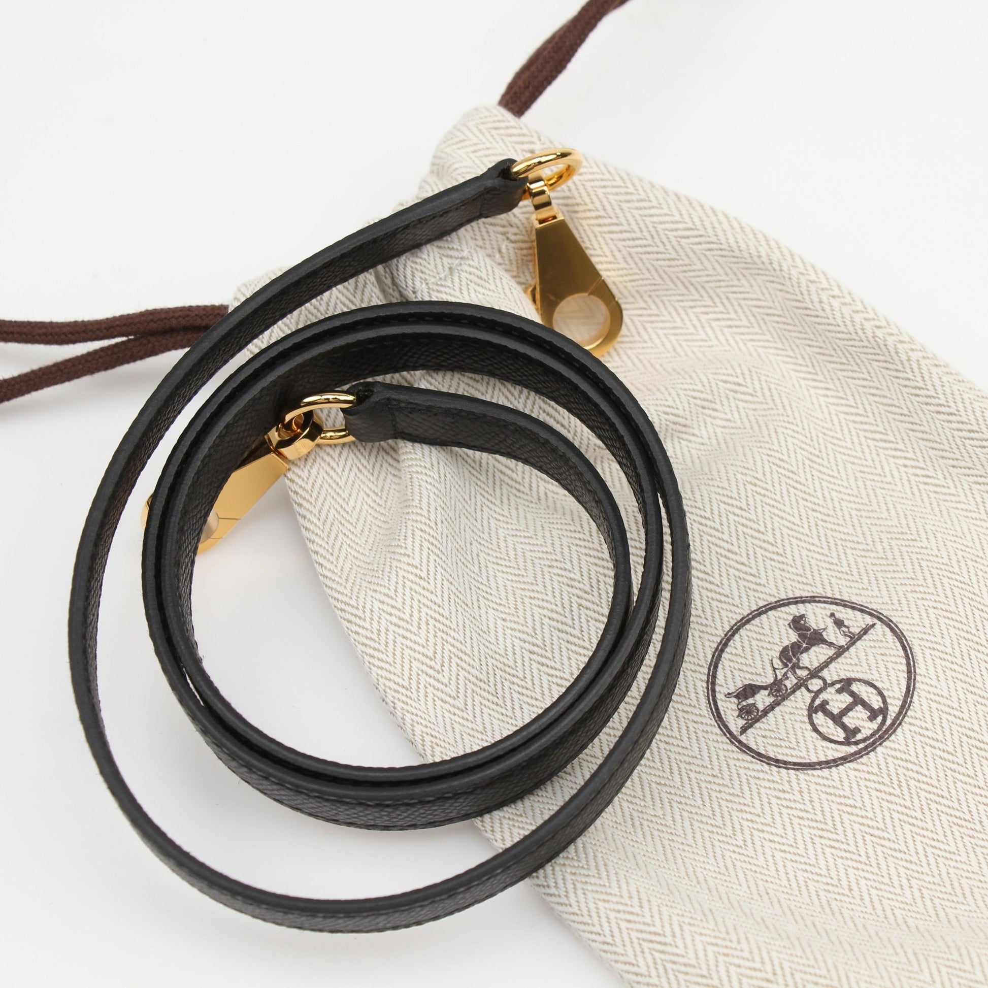 Hermès Kelly 25 Sellier handbag in classic leather, featuring structured design and gold hardware, by Gold & Beyond.