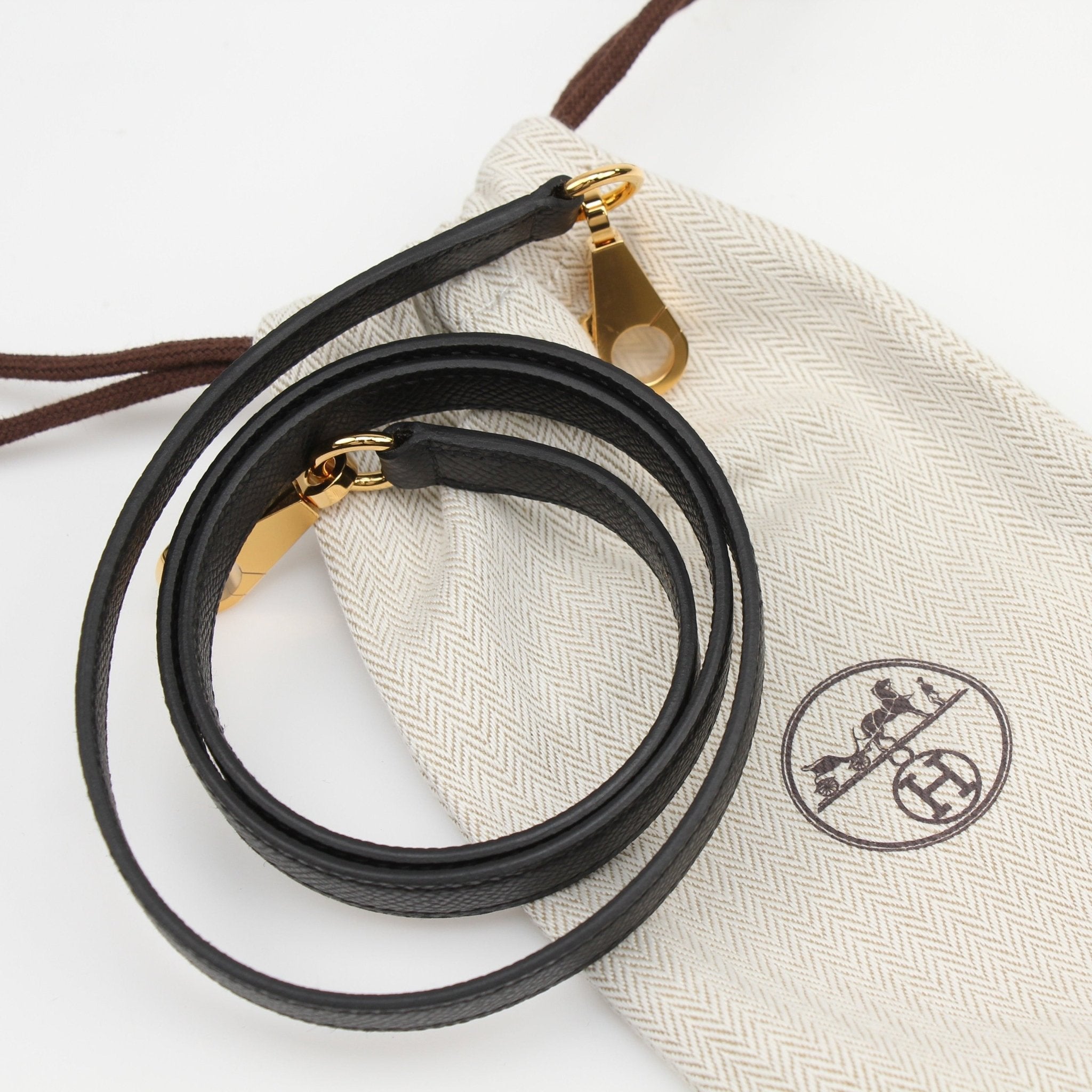 Hermès Kelly 25 Sellier handbag in classic leather, featuring structured design and gold hardware, by Gold & Beyond.