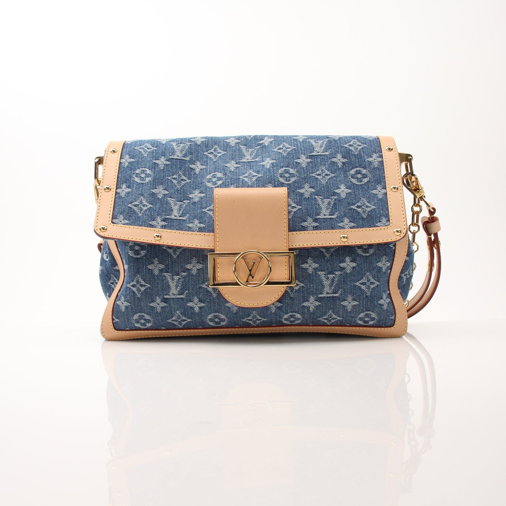 Louis Vuitton Dauphine GM shoulder handbag with gold hardware and monogram canvas, stylish and spacious for everyday use.