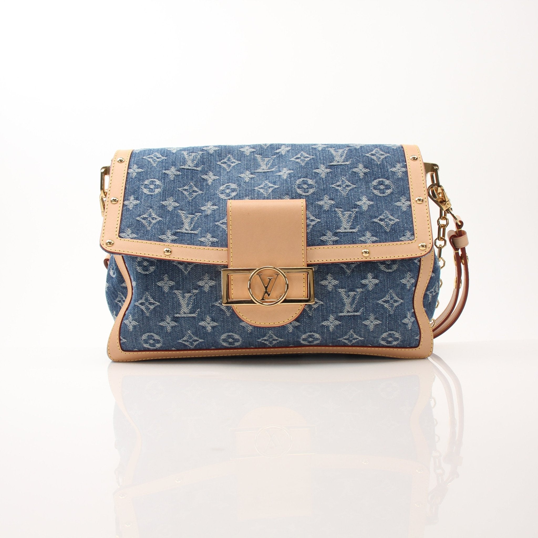Louis Vuitton Dauphine GM shoulder handbag with gold hardware and monogram canvas, stylish and spacious for everyday use.