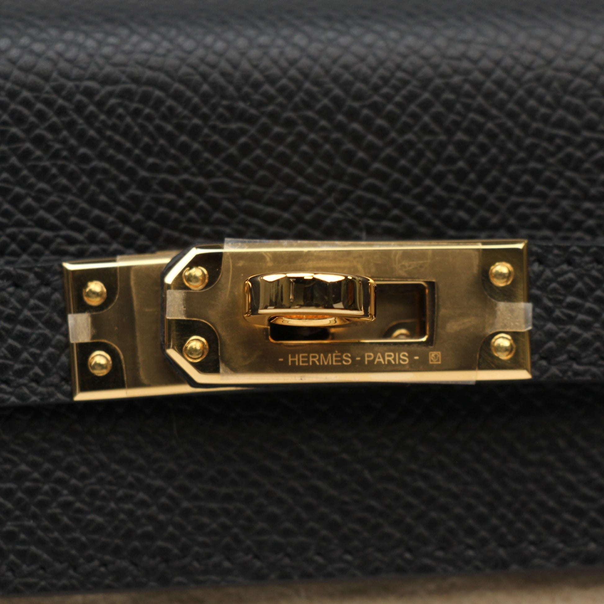 Hermès Kelly 25 Sellier handbag in luxurious leather with gold hardware, crafted by Gold & Beyond.