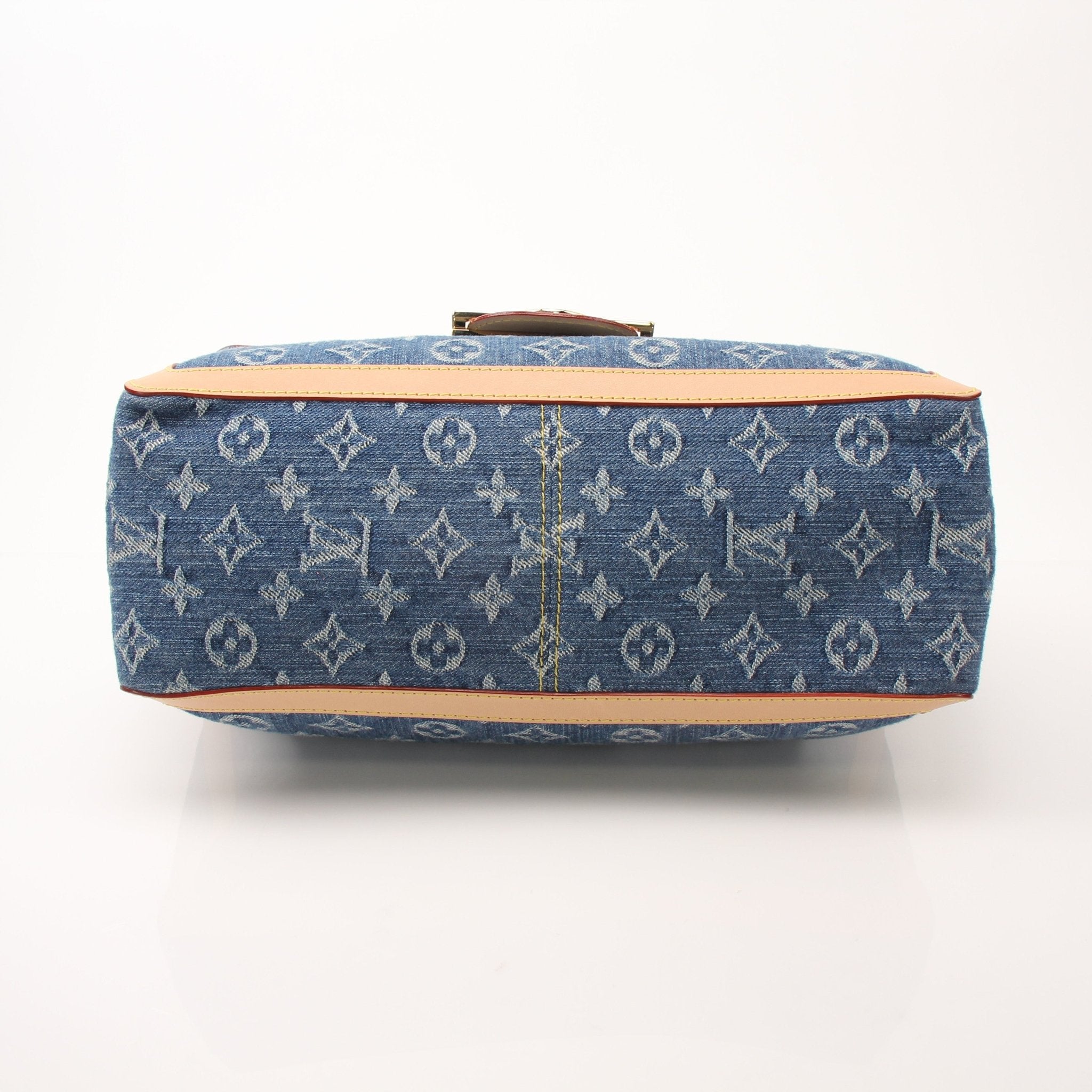 Gold & Beyond Louis Vuitton Dauphine GM shoulder handbag with structured design and leather strap, displayed on a neutral background.