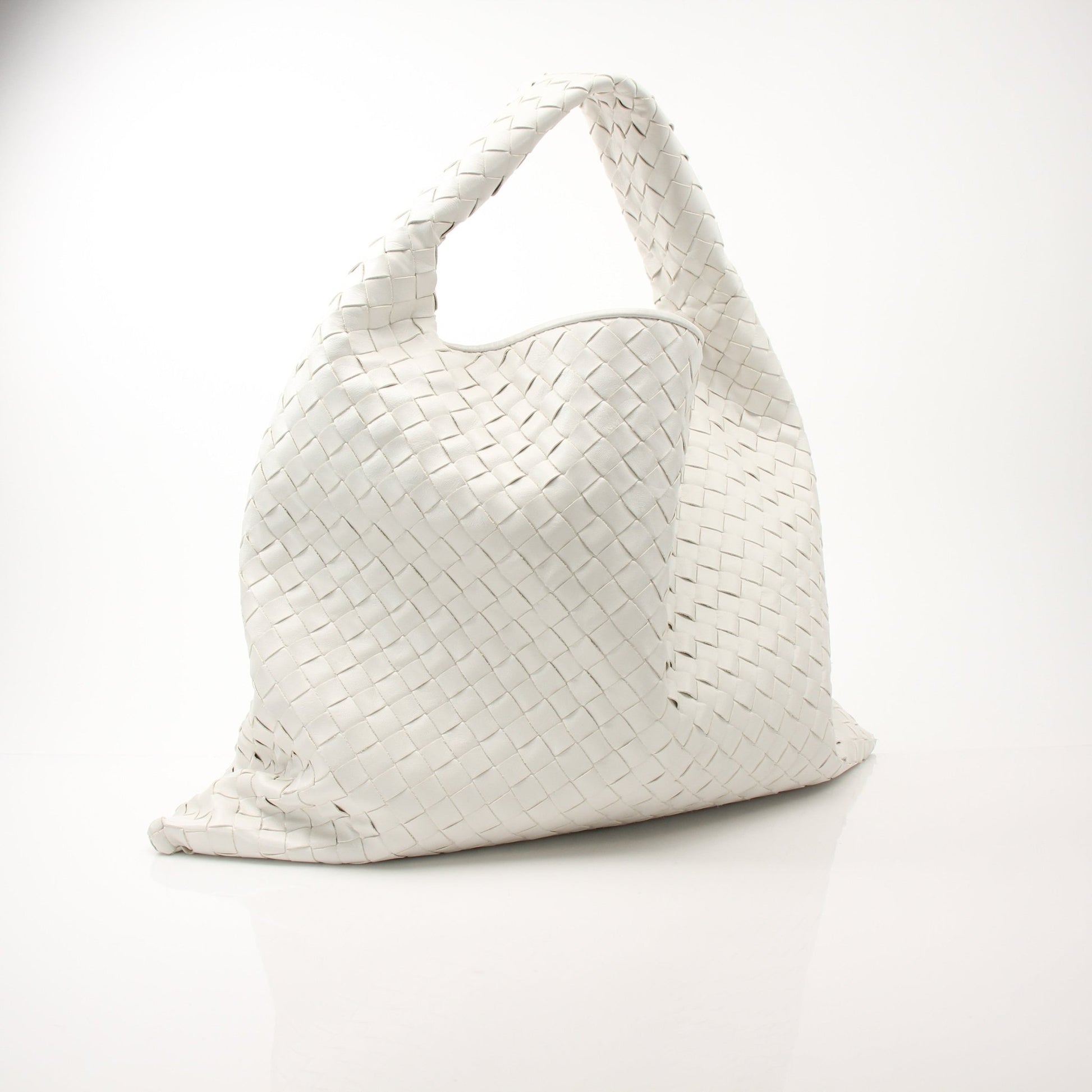 Large white Bottega Veneta Intrecciato leather hobo handbag with spacious design and woven texture, stylish and elegant.
