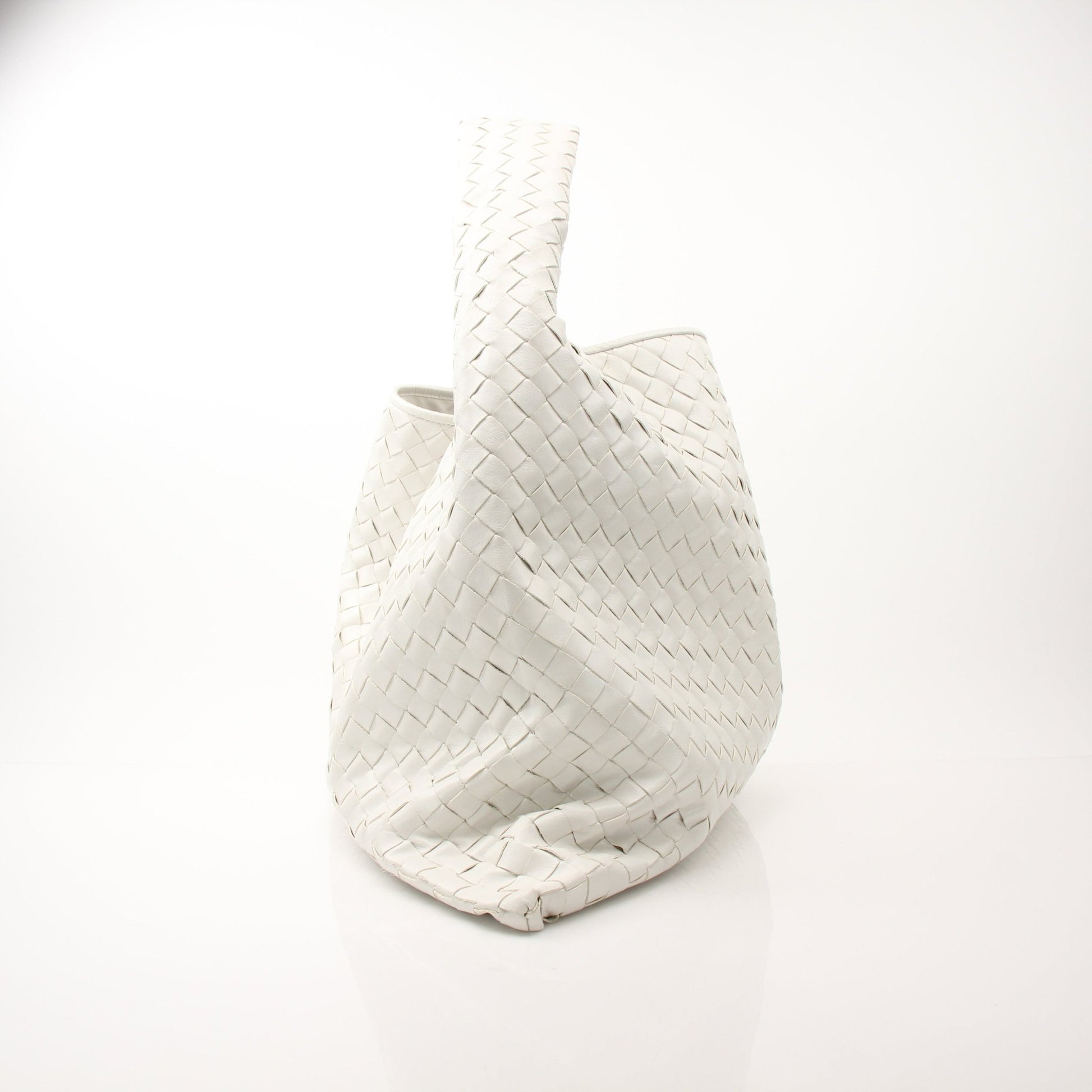 Large white Bottega Veneta Intrecciato leather hobo handbag with woven pattern and shoulder strap, stylish and spacious.