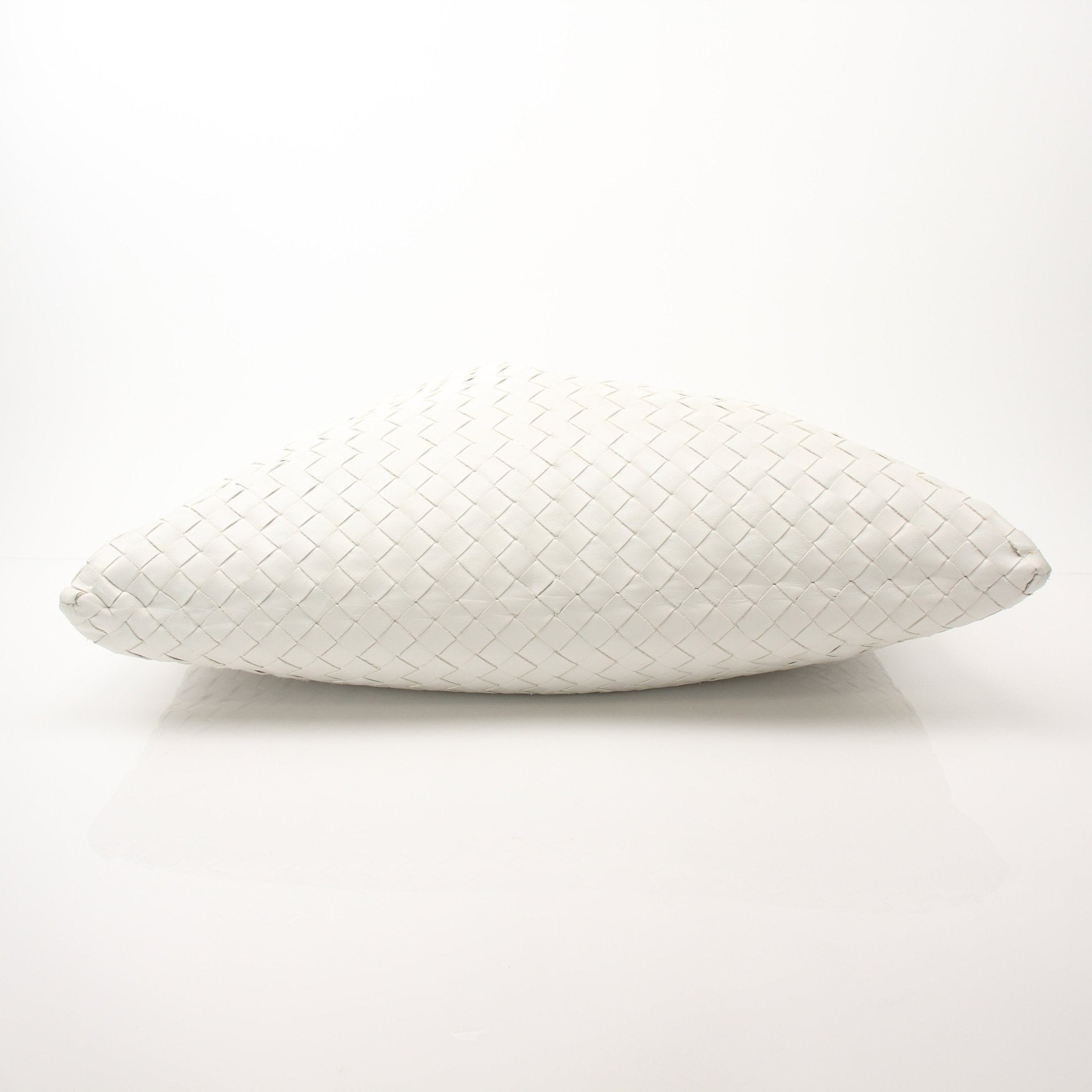 Large white Bottega Veneta leather hobo bag with intrecciato woven design, featuring a spacious shape and shoulder strap.