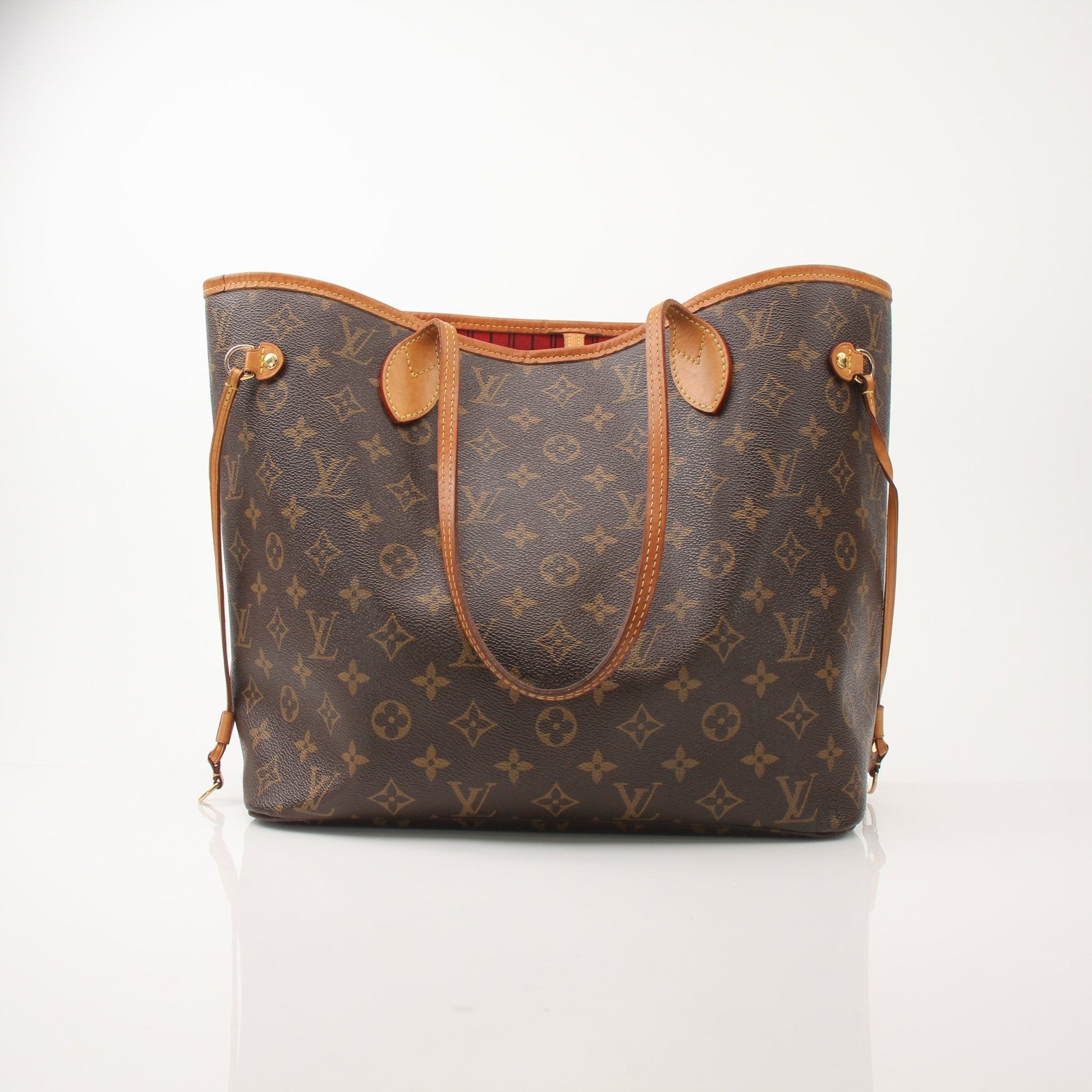 Louis Vuitton Neverfull MM tote handbag by Gold & Beyond, showing beige monogram canvas with leather trim and spacious interior.