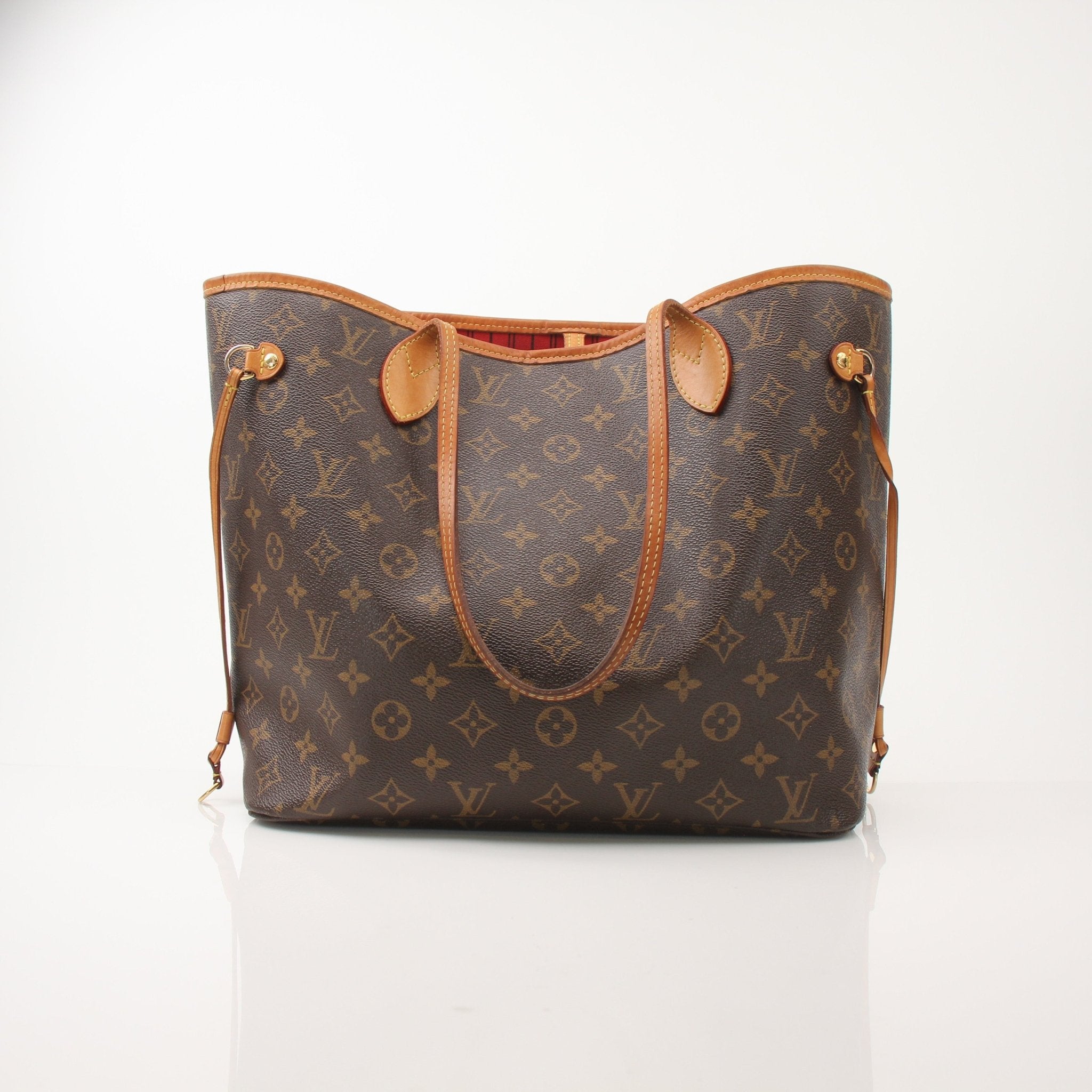 Louis Vuitton Neverfull MM tote handbag by Gold & Beyond, showing beige monogram canvas with leather trim and spacious interior.