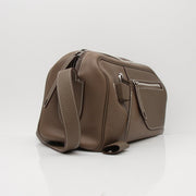 Hermès Petite Courrier handbag by Gold & Beyond, showcasing its luxurious leather exterior and elegant design.