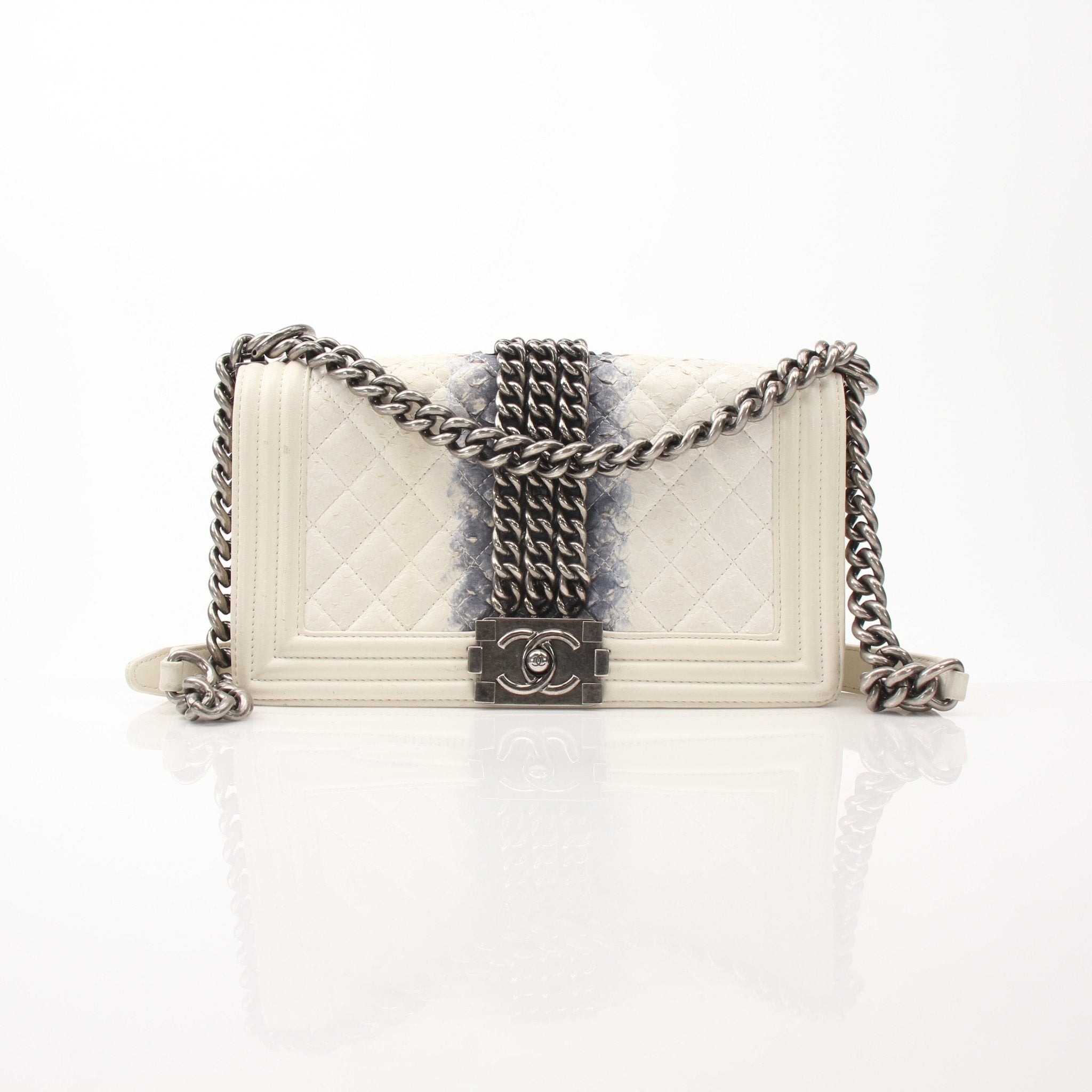 Gold & Beyond Chanel Quilted Mini Flap Bag handbag with gold chain strap and signature quilting detail.