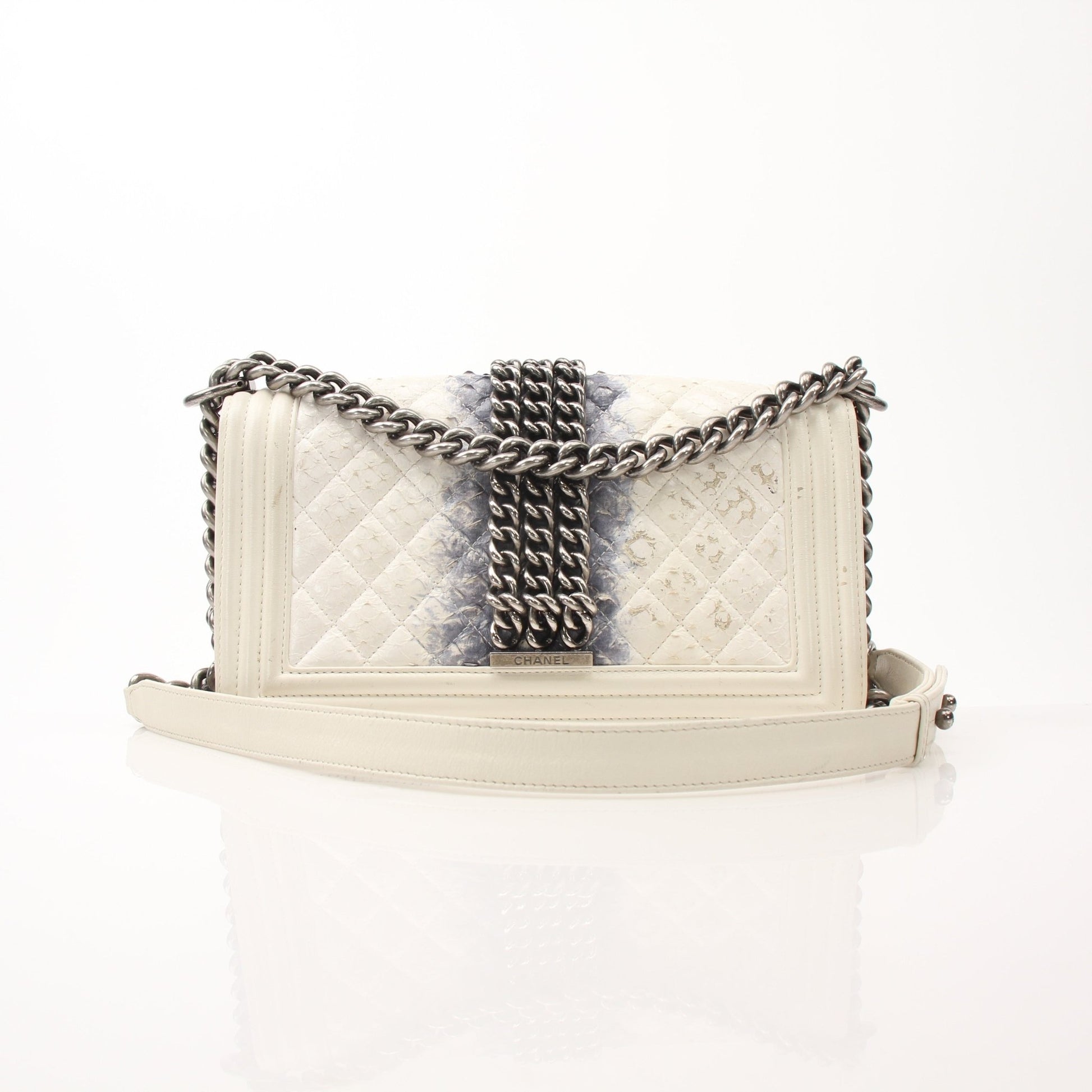 Gold & Beyond Chanel Quilted Mini Flap Bag handbag with gold chain strap and classic quilted design.