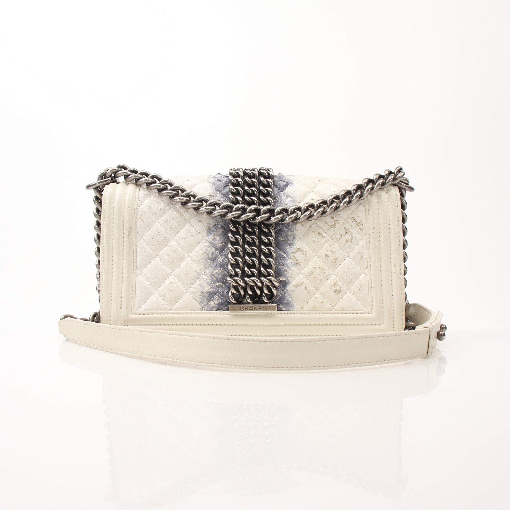 Gold & Beyond Chanel Quilted Mini Flap Bag handbag with gold chain strap and classic quilted design.