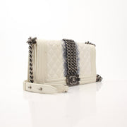Gold & Beyond Chanel Quilted Mini Flap Bag handbag with gold chain strap and signature quilted design.