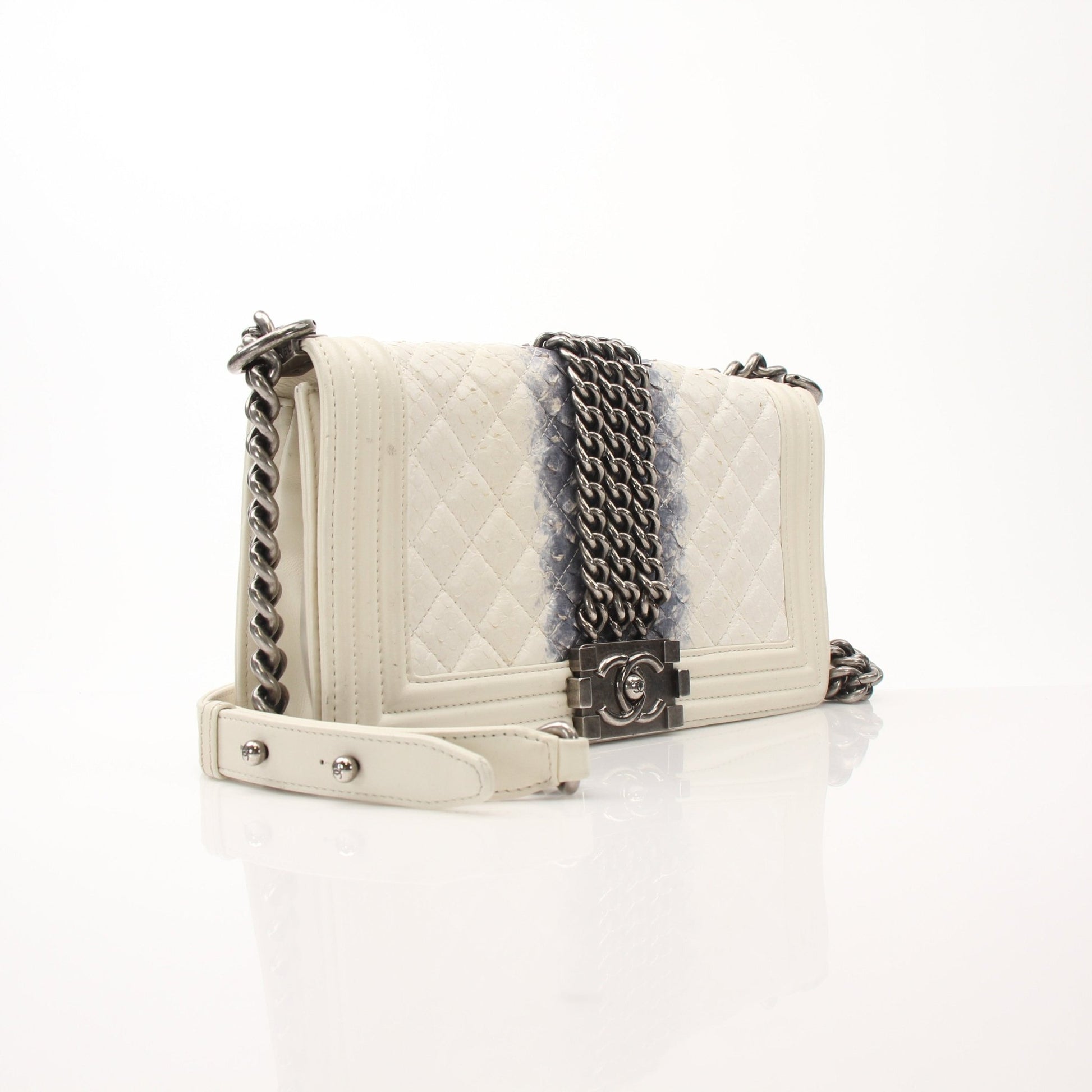 Gold & Beyond Chanel Quilted Mini Flap Bag handbag with gold chain strap and signature quilted design.