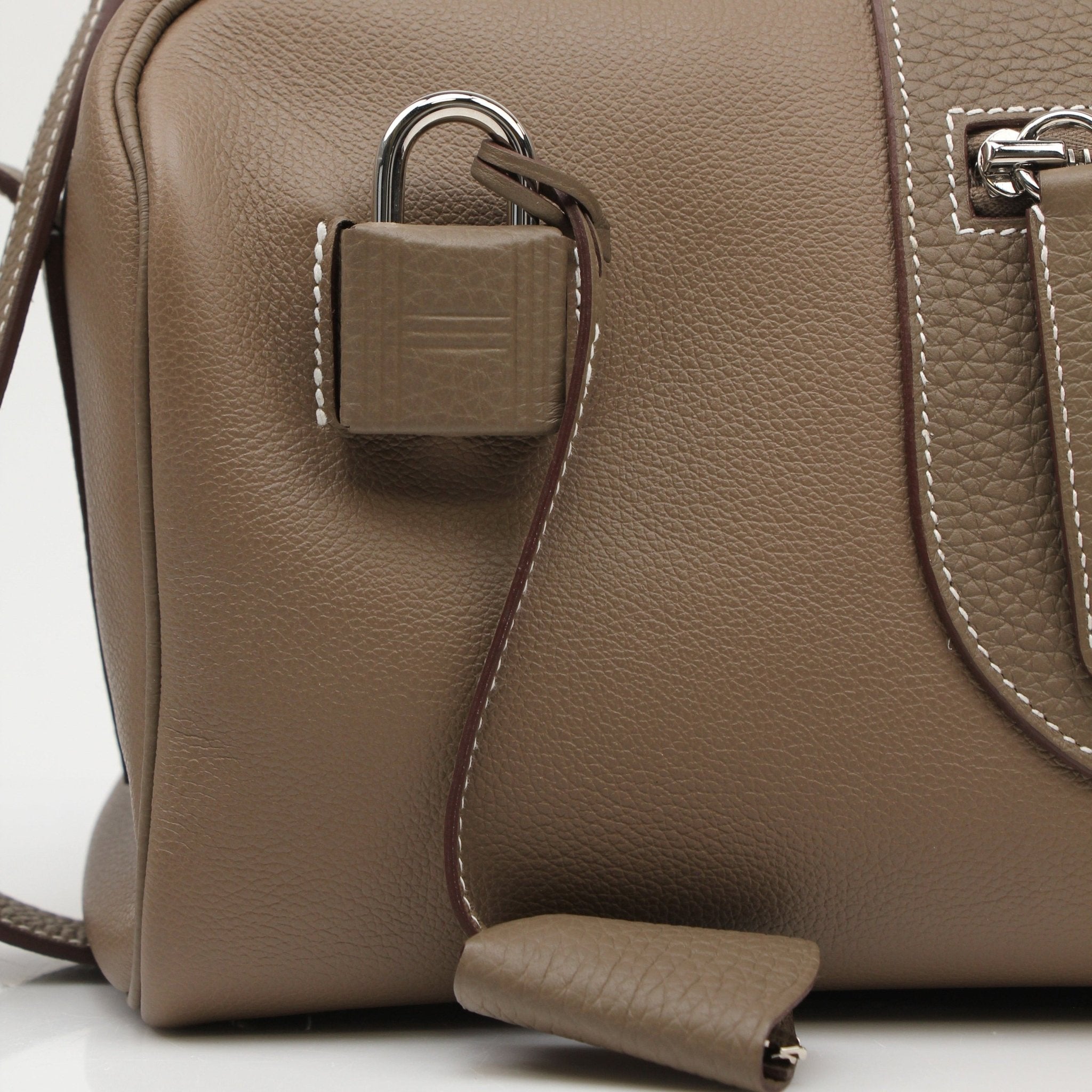 Hermès Petite Courrier handbag by Gold & Beyond, showcasing luxury leather with gold-tone hardware and compact design.
