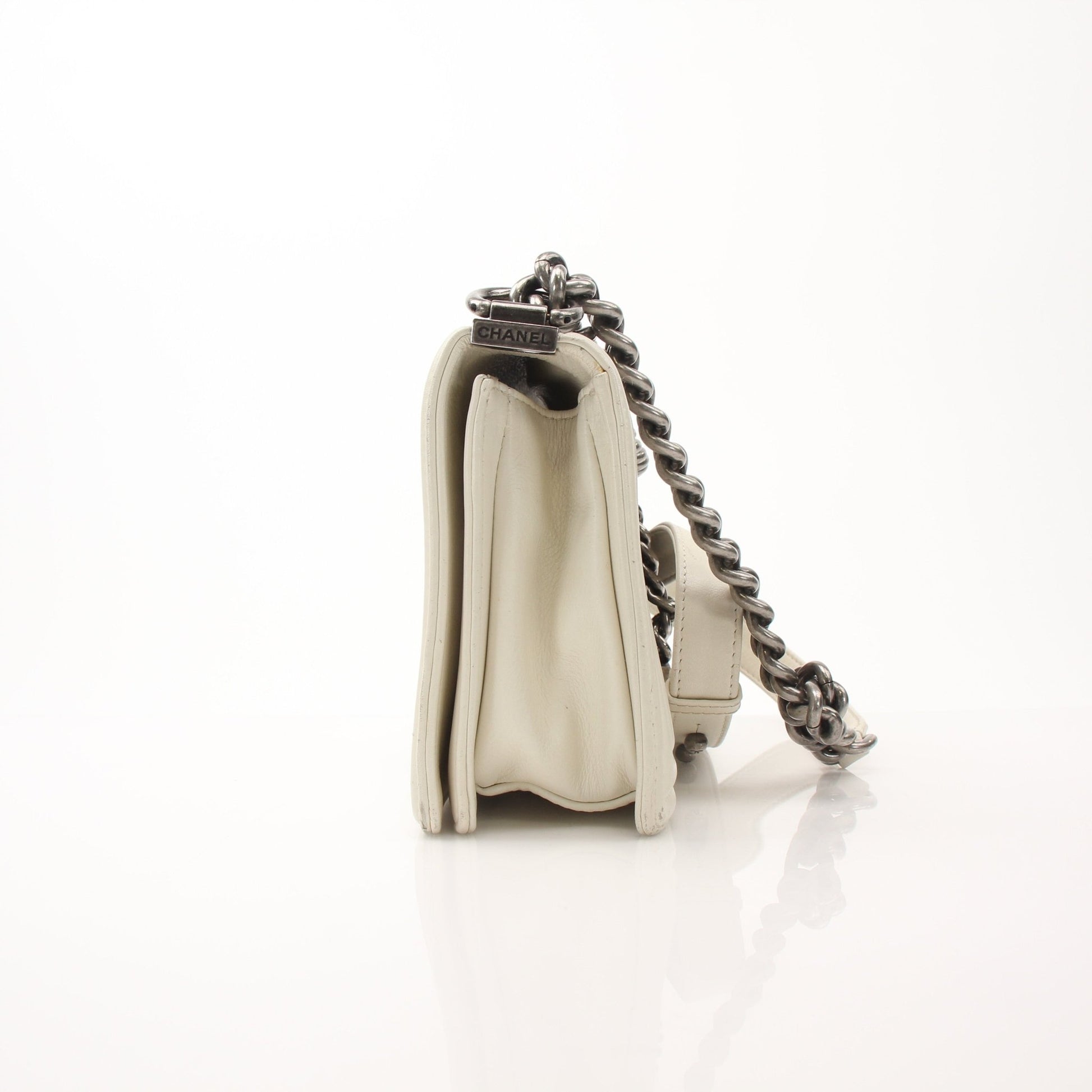 Gold & Beyond Chanel Quilted Mini Flap Bag handbag with gold chain strap and signature quilted design.